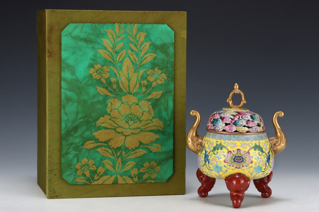 An Exquisite Enamel Yellow Ground Painted Gold Lotus and Auspicious Cloud Pattern Elephant-Ears: An Exquisite Enamel Yellow Ground Painted Gold Lotus and Auspicious Cloud Pattern Elephant-Ears Tripod Censer,Qing Dynasty, China,Yongzheng Four-character Mark,Size:7.1inx5.9in 珐琅彩