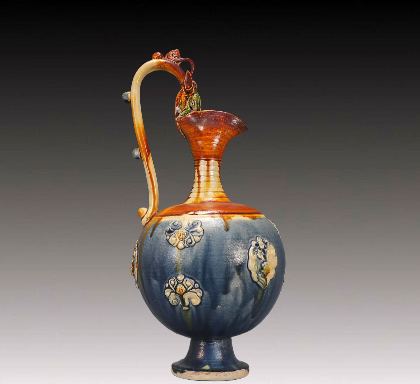 A Rare Tang Tri-Color Glazed Pottery Flower Pattern Dragon-Handle Ewer (1 of 9)