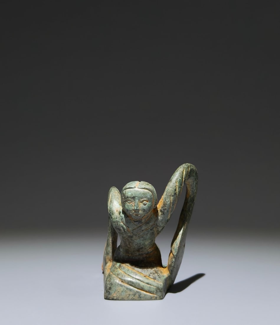 An Archaic Bronze Figure Ornament (1 of 9)