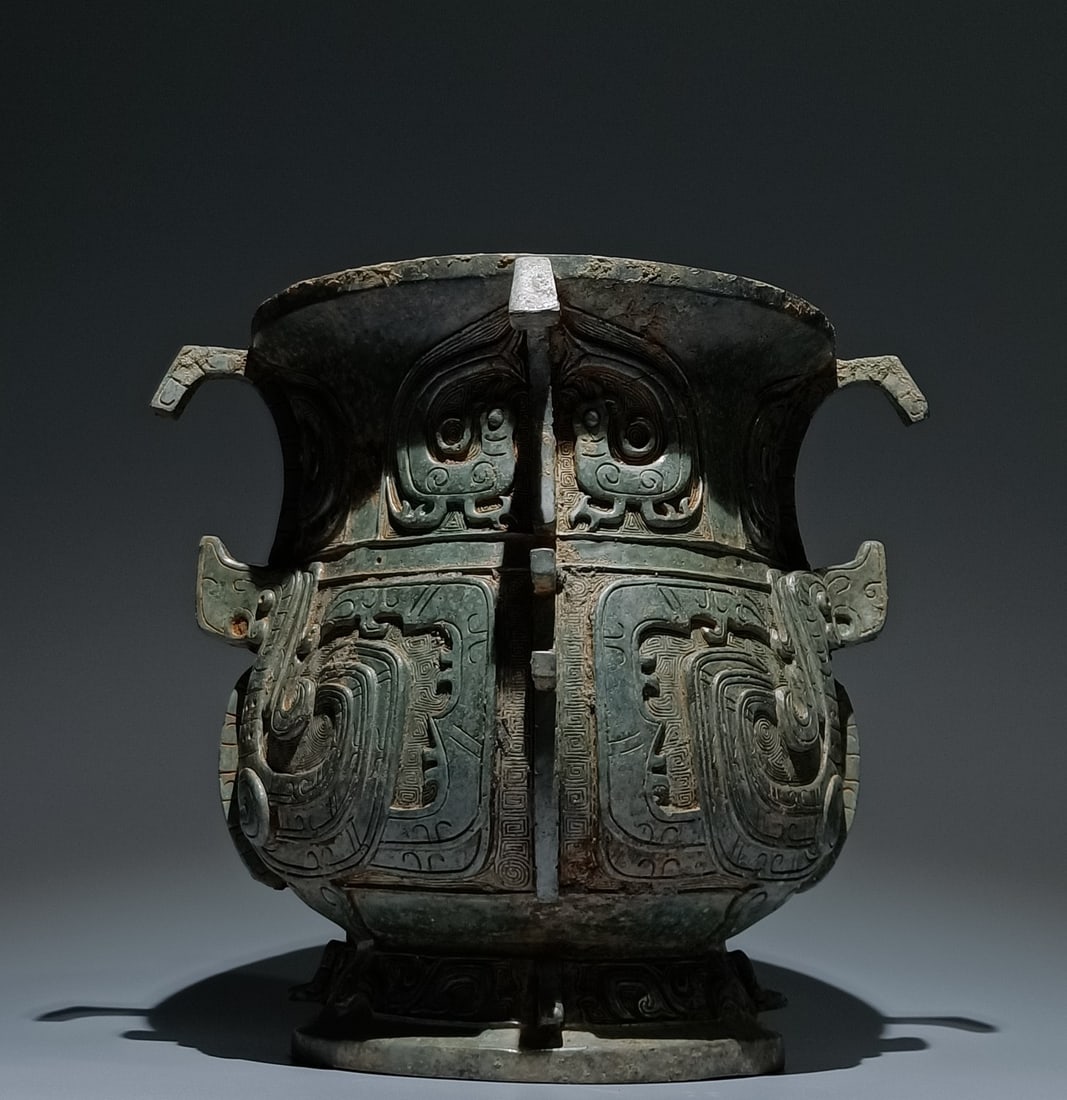 An Archaic Bronze Phoenix Pattern Libation Cup (1 of 9)