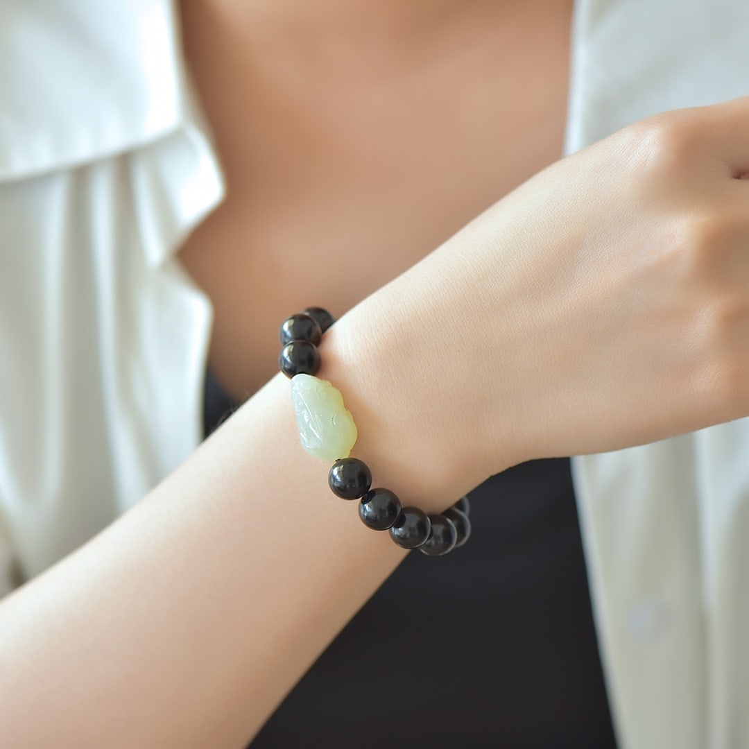 An Exquisite White Jade Ebony Bracelets (1 of 6)