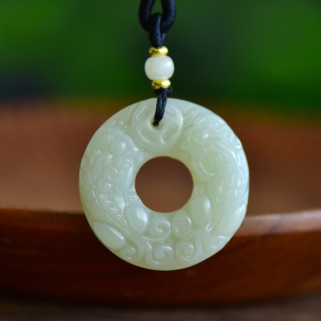 An Exquisite White Jade Auspicious Beast Pattern Pendant (1 of 5)