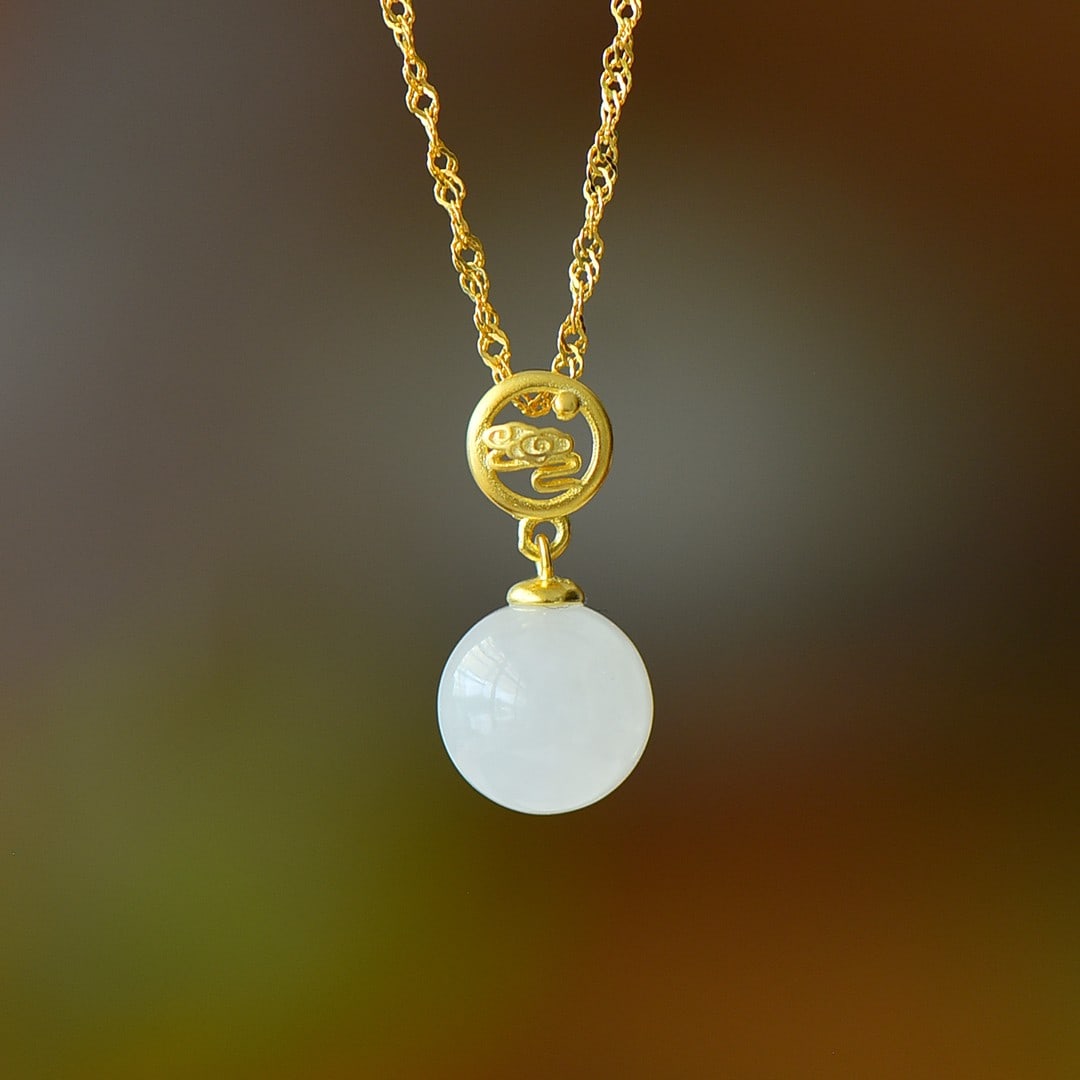 An Exquisite Sterling Silver-Gold Plated Inlaid White Jade Pendant: An Exquisite Sterling Silver-Gold Plated Inlaid White Jade Pendant,Size:10mm 纯银镀金镶白玉吊坠
