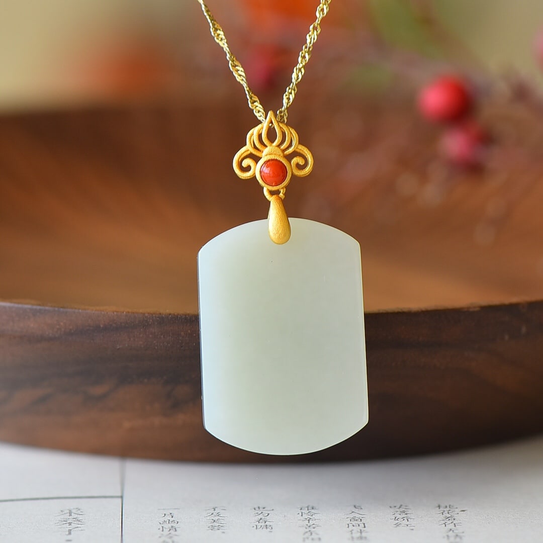 An Exquisite Sterling Silver-Gold Plated Inlaid White Jade Pendant: An Exquisite Sterling Silver-Gold Plated Inlaid White Jade Pendant,Size:20mmx30mm 纯银镀金镶白玉吊坠