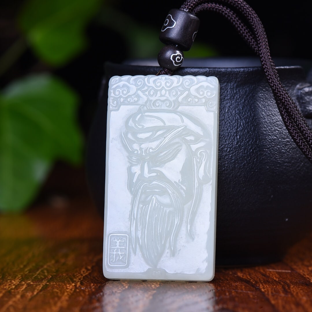 An Exquisite White Jade Guangong Pattern Pendant (1 of 5)