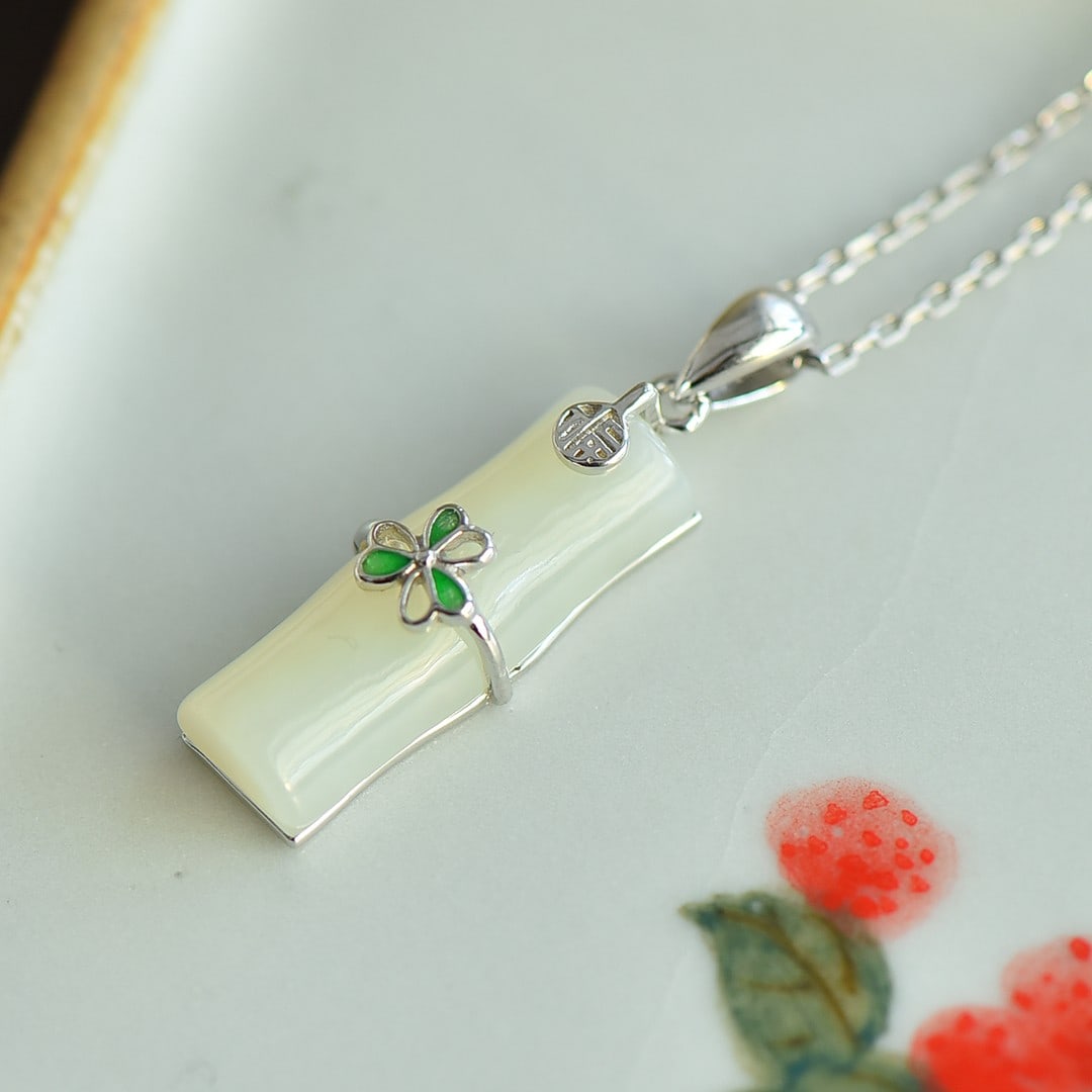 An Exquisite Sterling Silver Inlaid White Jade Pendant (1 of 5)