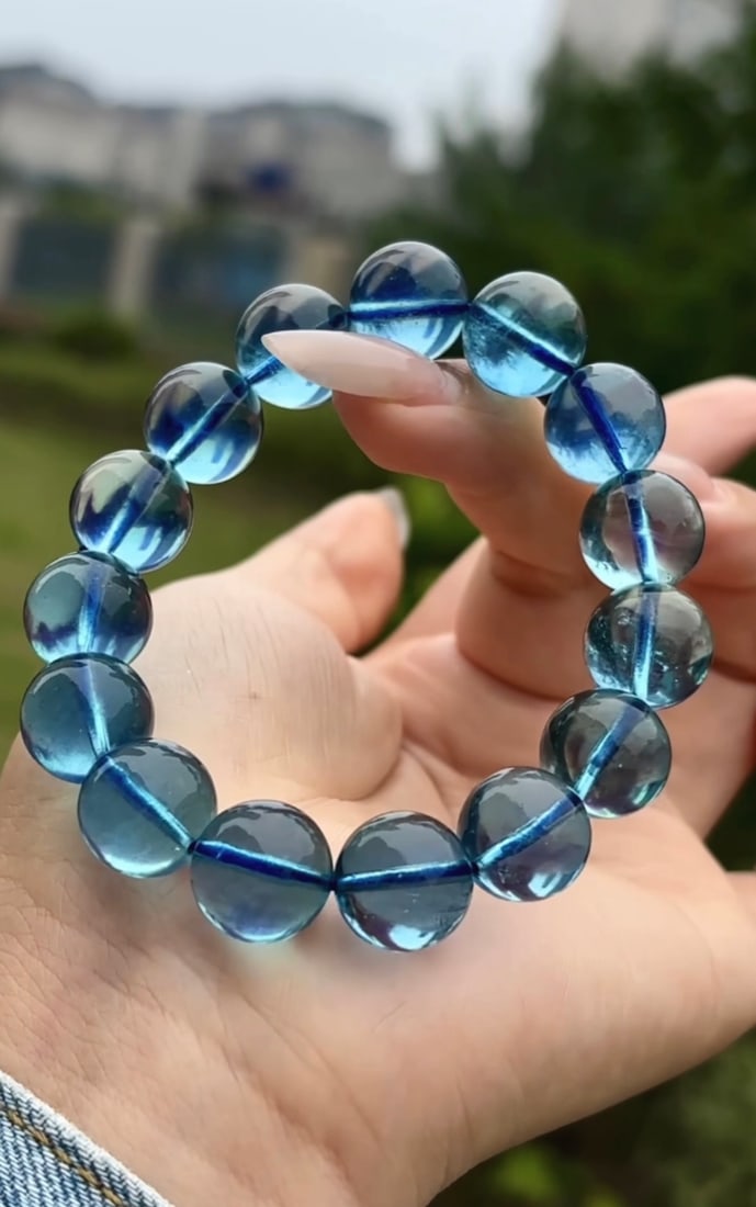 An Exquisite Aquamarine Bracelets: An Exquisite Aquamarine Bracelets,Size:13.3mm,Weight:48.9g 海蓝宝手串