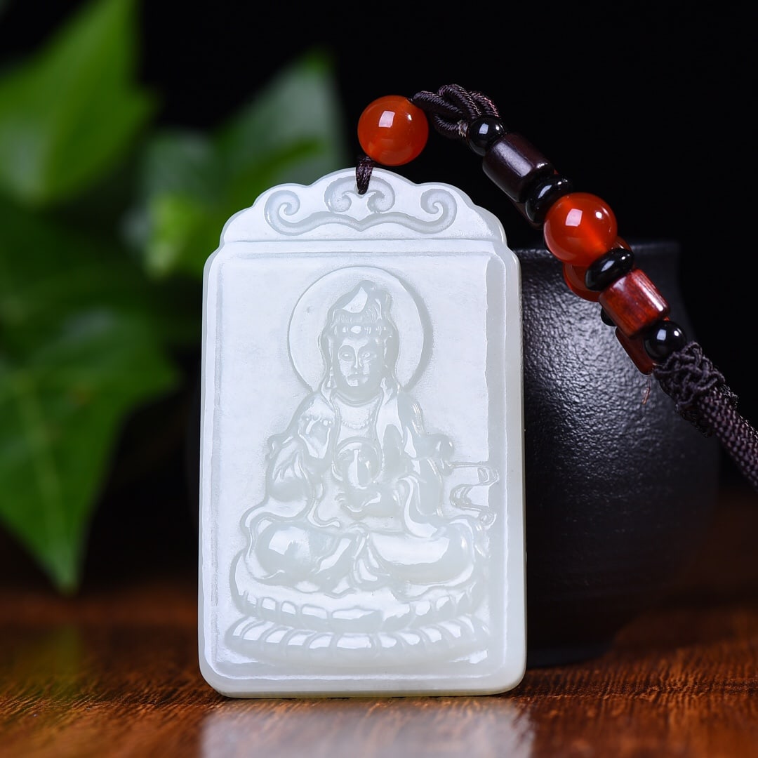 An Exquisite White Jade Avalokitesvara Pattern Pendant: An Exquisite White Jade Avalokitesvara Pattern Pendant,Size:36mmx60mm (寓意)吉祥 普度众生 大慈大悲 