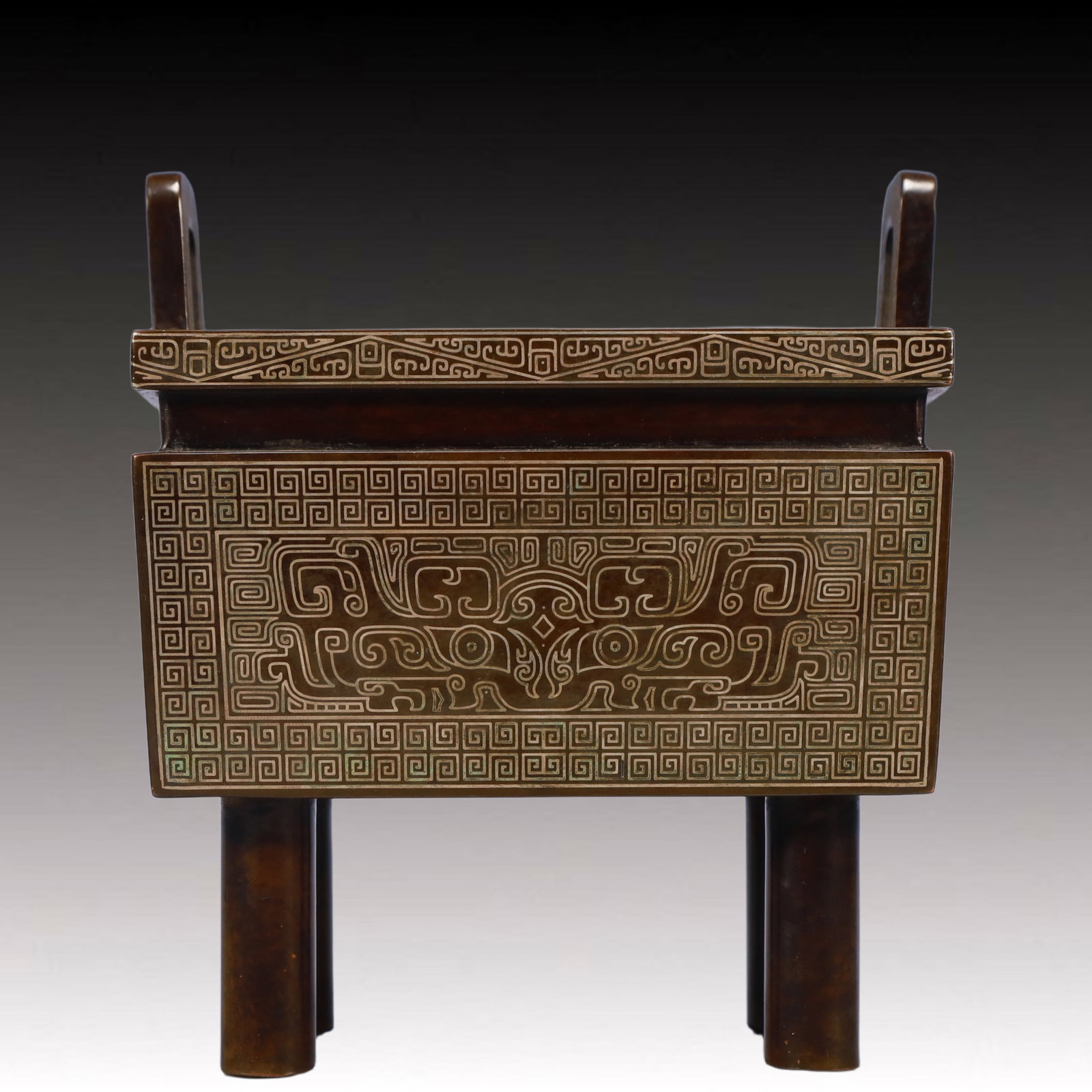 An Exquisite Bronze Beast-Face Pattern Double-Ears and Four Legs Censer: An Exquisite Bronze Beast-Face Pattern Double-Ears and Four Legs Censer,Qing Dynasty, China,With Mark,Size:5.3inx3.5inx6.1in,Weight:2850g 