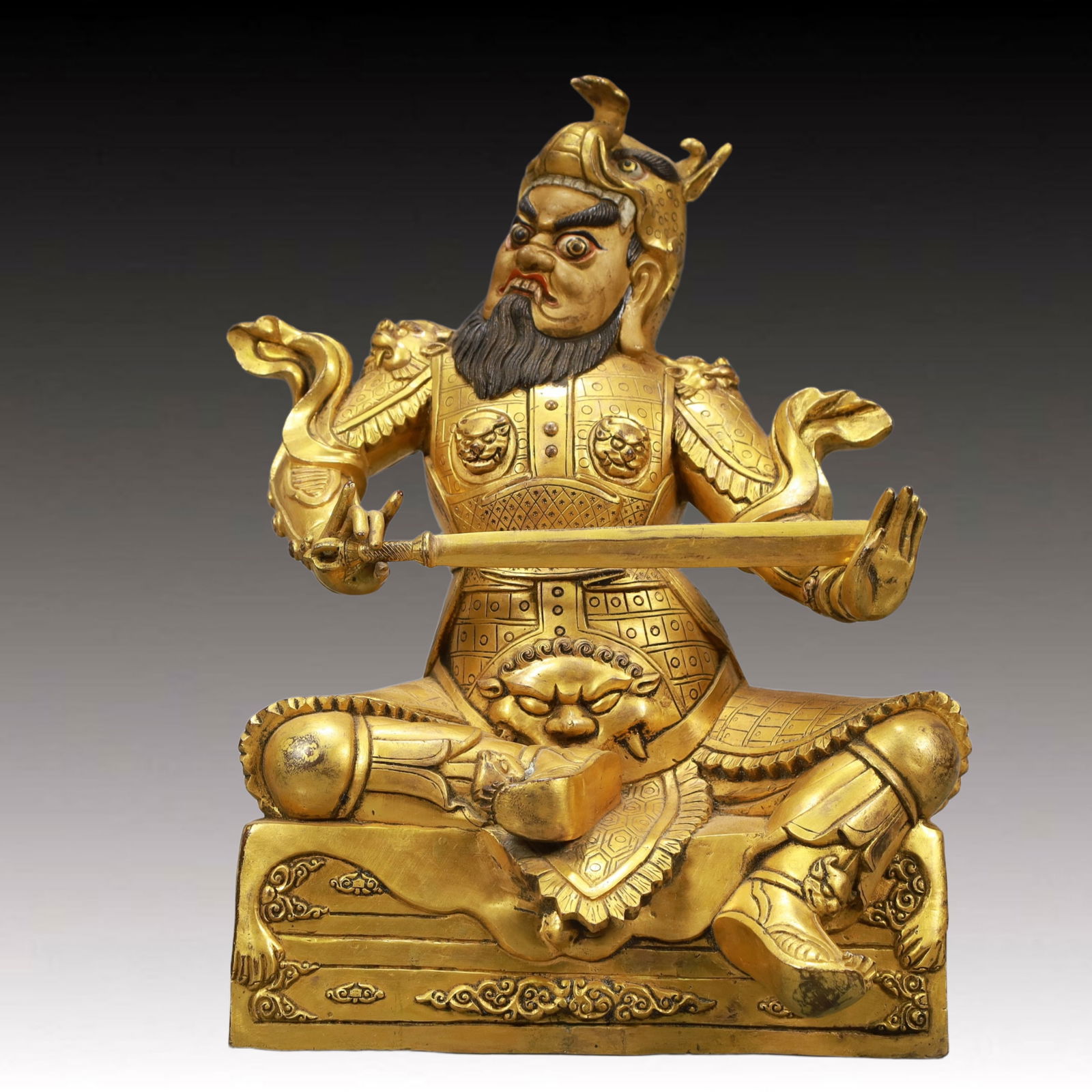 A Solemn Gilt Bronze Statue of 'Guan Gong': A Solemn Gilt Bronze Statue of 'Guan Gong',Ming Dynasty, China,Size:8.3inx7.3inx11.4in,Weight:7500g 铜鎏金关公像,中国明代