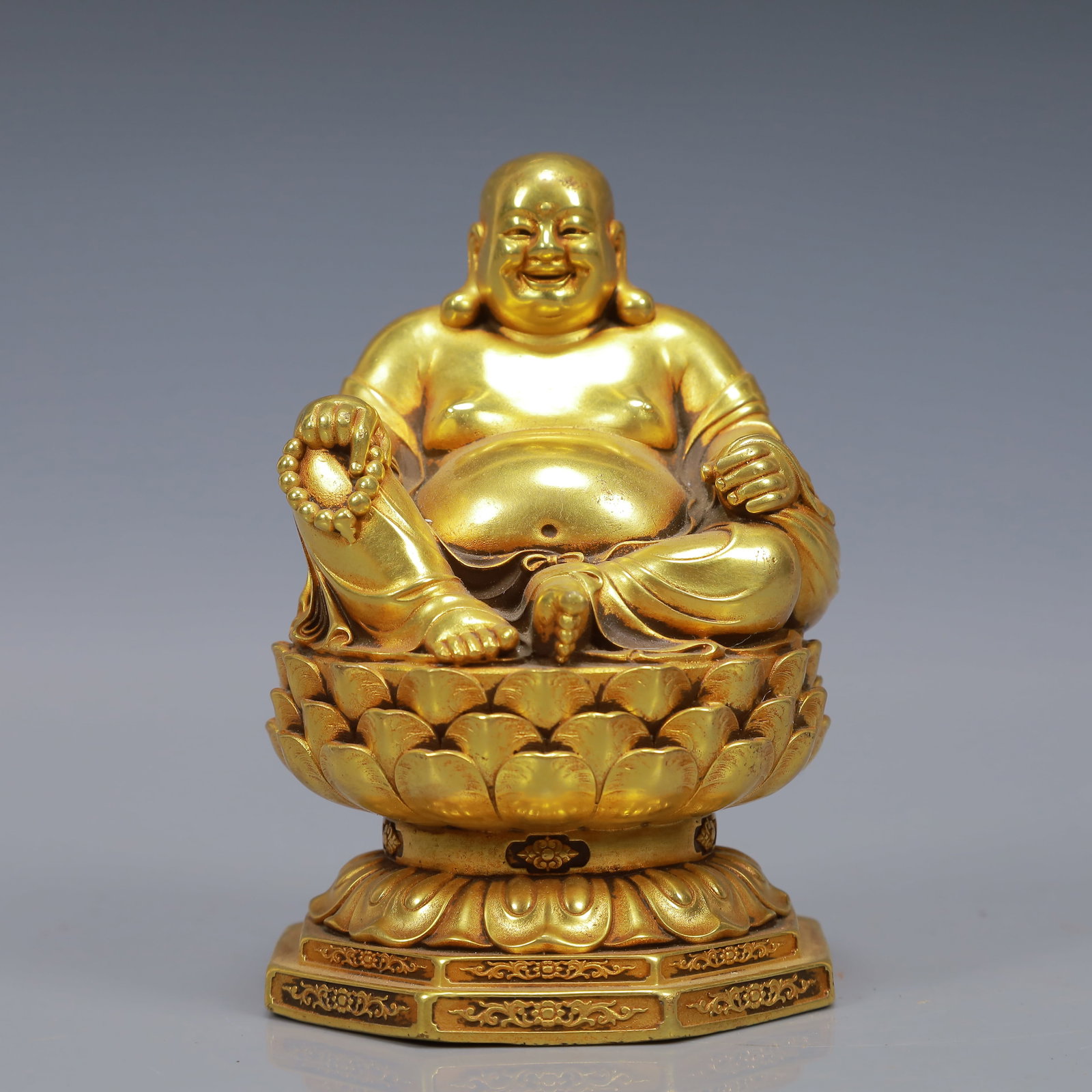 An Exquisite Gilt Bronze Statue of Maitreya Buddha: An Exquisite Gilt Bronze Statue of Maitreya Buddha,Ming Dynasty, China,Yongle Six-character Mark,Size:3.1inx4.7in,Weight:1000g 铜鎏金弥勒佛像,中国