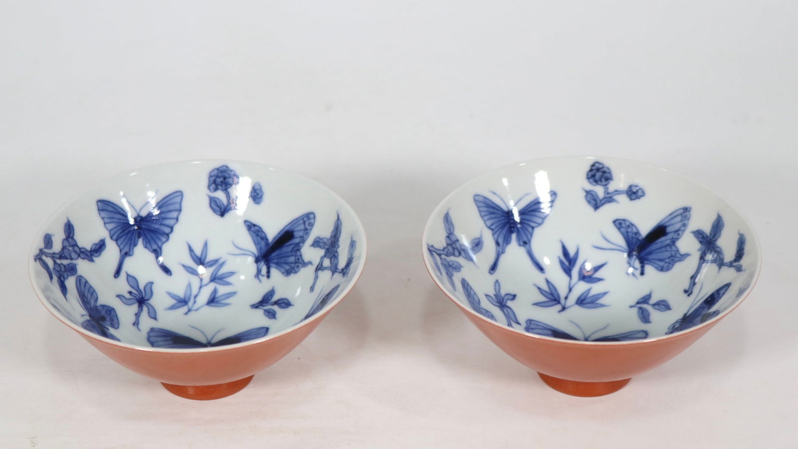 A Pair of Exquisite Blue and White Coral Red Glazed Flower and Butterfly Pattern Bowls: A Pair of Exquisite Blue and White Coral Red Glazed Flower and Butterfly Pattern Bowls,Qing Dynasty,China,Yongzheng Six-character Mark,Size:3.9inx1.9ins 
