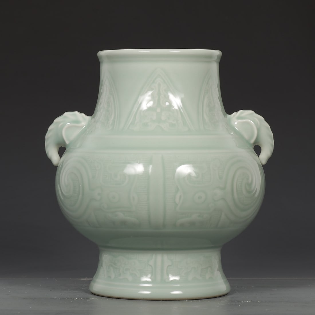 An Exquisite Celadon Glazed Auspicious Beast Pattern Elephant-Ears Vase: An Exquisite Celadon Glazed Auspicious Beast Pattern Elephant-Ears Vase,Qing Dynasty,China ,Qianlong Six-character Mark,Size:10.2inx9.4in 粉青釉瑞兽纹象೑