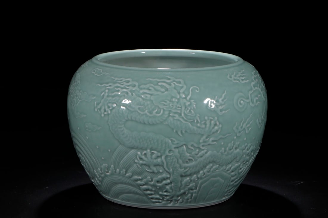 An Exquisite Celadon Glazed Seawater and Dragon Pattern Vat (1 of 8)