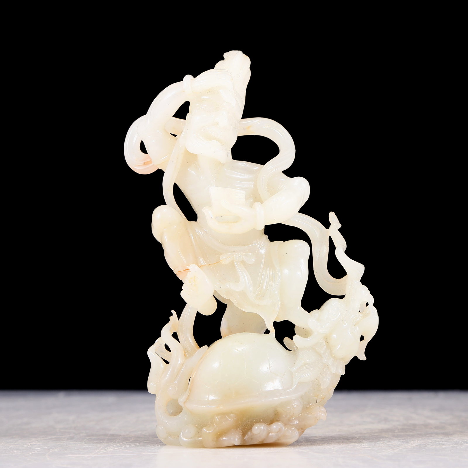 An exquisite white jade figure ornament: An exquisite white jade figure ornament , Qing Dynasty, China. Jade exhibits delicate, delicate, warm and lustrous qualities. The craftsmanship is flawless, the design is exquisite, and the carvings a