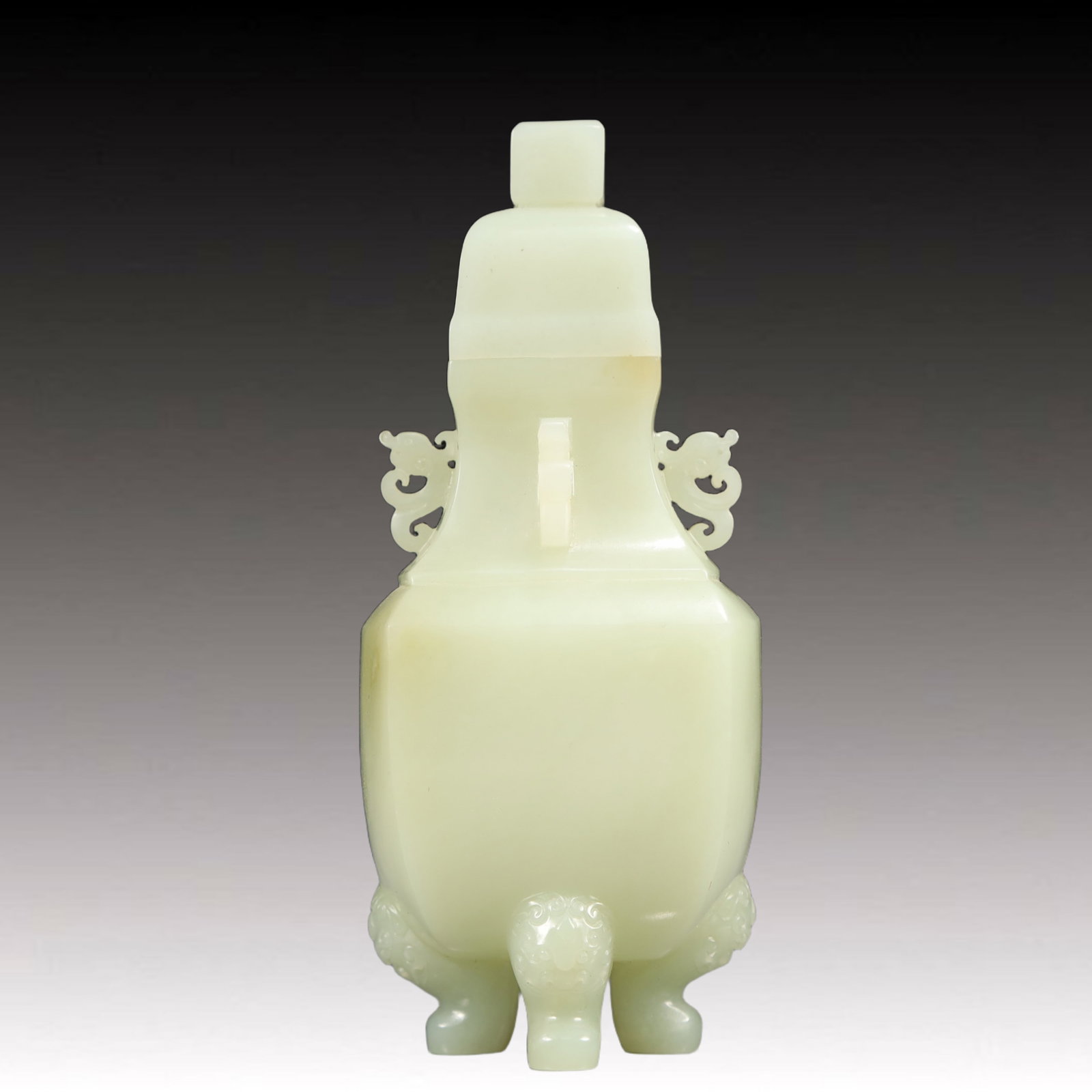An Exquisite White Jade Phoenix-Ears and Beast-legs Bottle: An Exquisite White Jade Phoenix-Ears and Beast-legs Bottle,Qing Dynasty, China,Size:2.6inx5.9in,Weight:400g 白玉凤耳兽足瓶带盖,中国