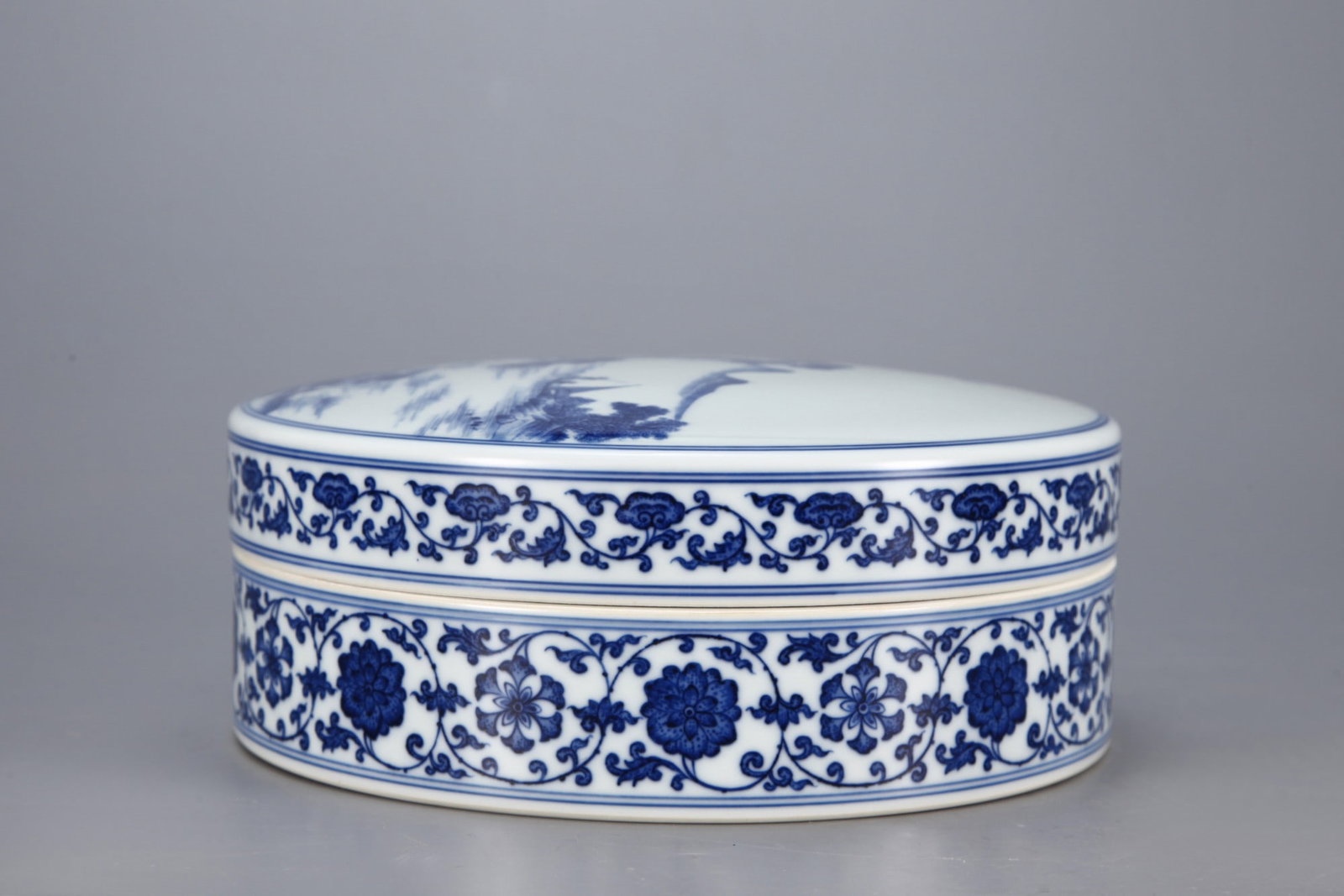 An Exquisite Blue and White Landscape and Figure Pattern Box: An Exquisite Blue and White Landscape and Figure Pattern Box,Qing Dynasty,China,Yongzheng Six-character Mark,Size:3.1inx9.3in 青花山水人物纹盒,中&