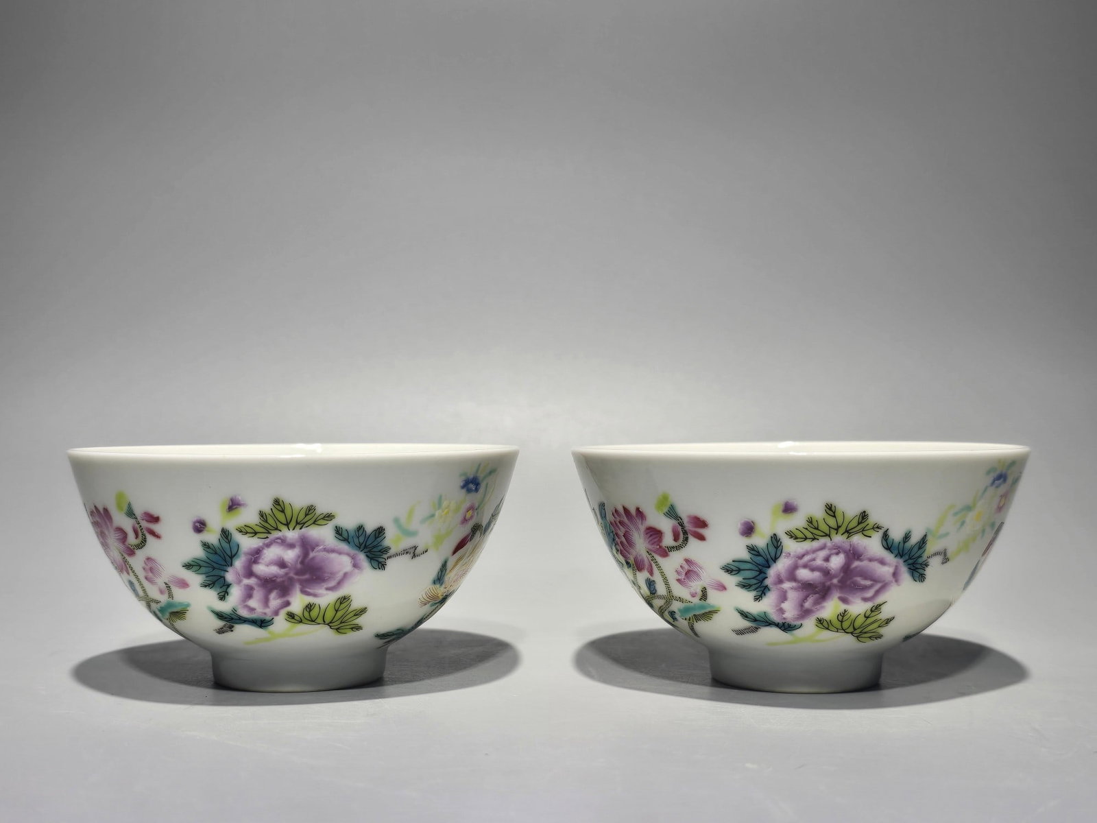 A Pair of Exquisite Famille-Rose Flower Pattern Cups: A Pair of Exquisite Famille-Rose Flower Pattern Cups,Qing Dynasty,China,Yongzheng Six-character Mark,Size:1.9inx3.6in 一对粉彩花卉纹杯,中国&
