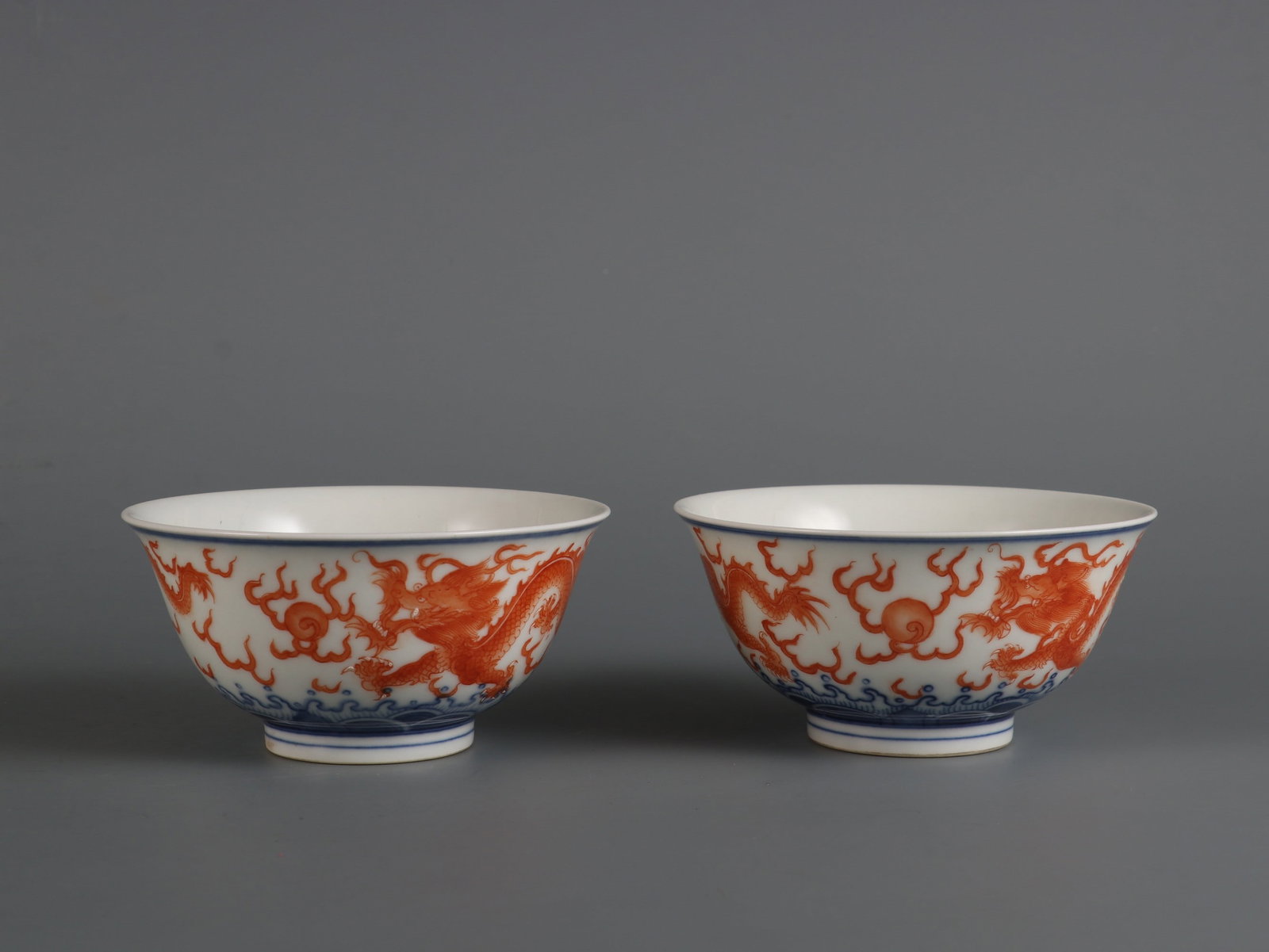 A Pair of Exquisite Blue and White Iron-Red Seawater and Dragon Pattern Cups (1 of 9)