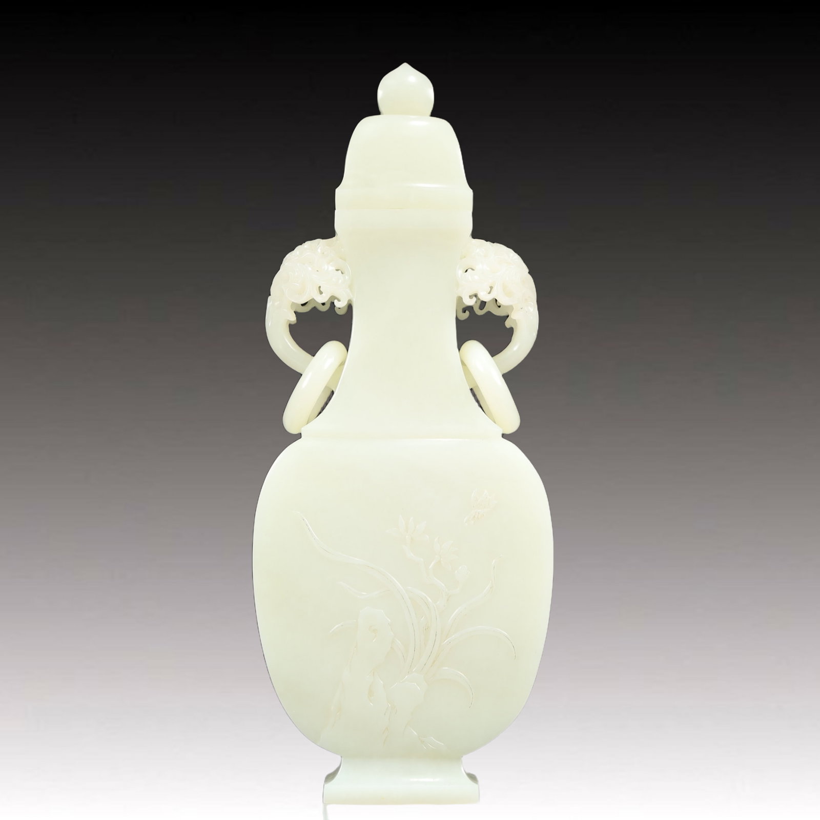 An Exquisite White Jade Flower Pattern Double-Ears Bottle: An Exquisite White Jade Flower Pattern Double-Ears Bottle,Qing Dynasty, China,Size:3.9inx1.6inx9.8in,Weight:750g 白玉花卉纹双耳瓶带盖,ߑ