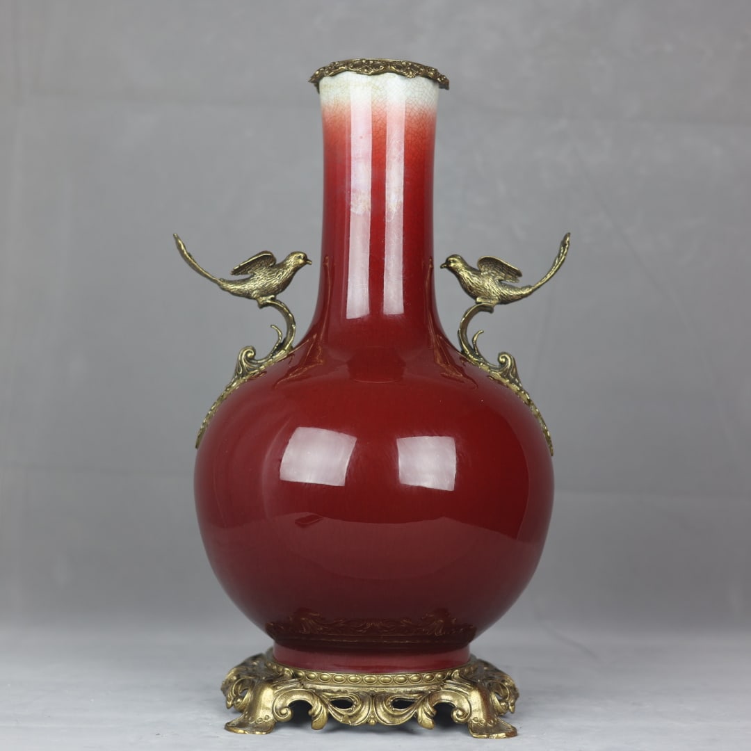 A Huge Red Glazed Inlaid Bronze Bird Pattern Double-Ears Vase: A Huge Red Glazed Inlaid Bronze Bird Pattern Double-Ears Vase,Qing Dynasty,China,Qianlong Six-Character Mark,Size:18.1inx10.2in 红釉嵌铜鸟纹双耳瓶