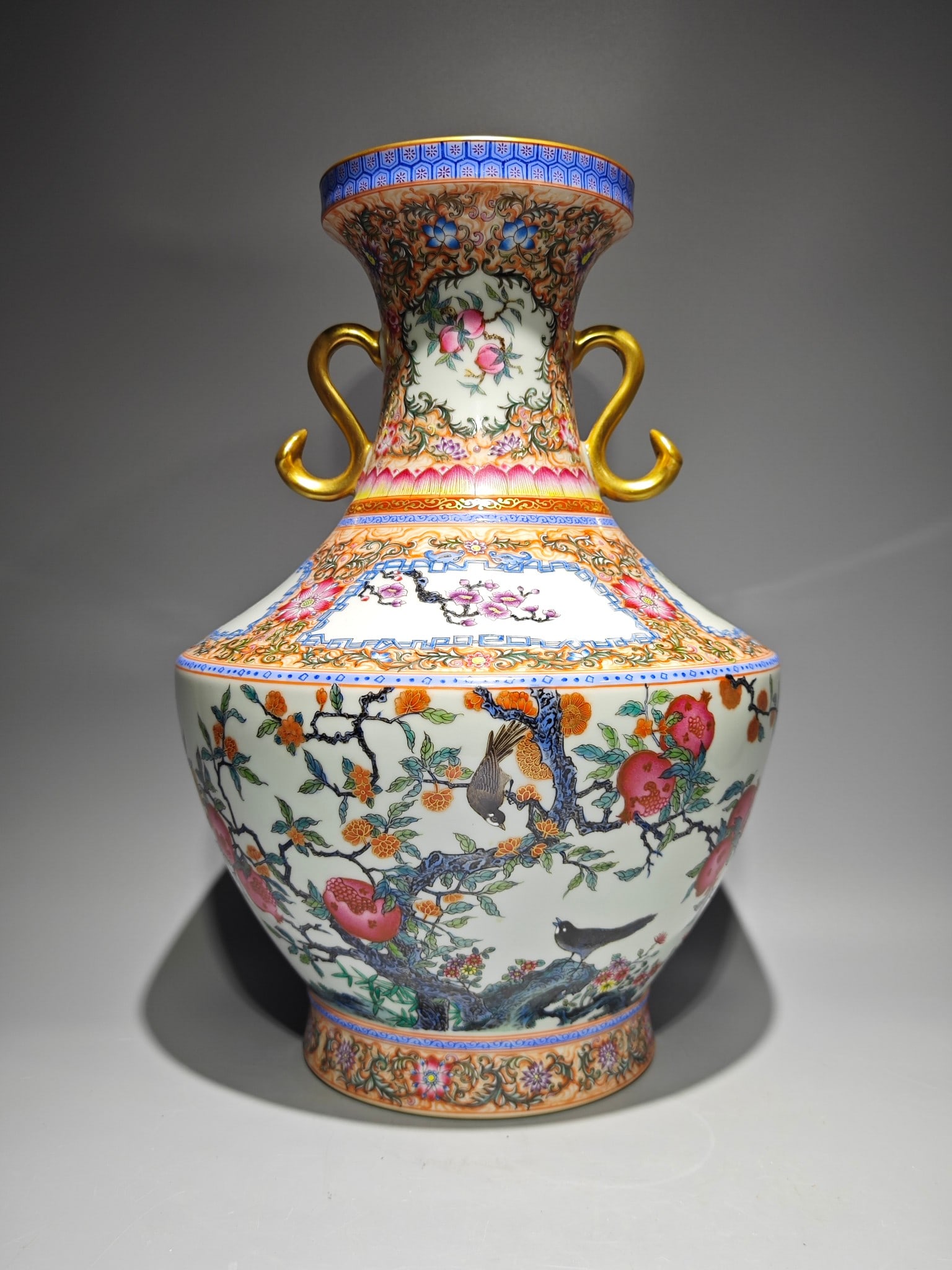 An Exquisite Enamel Flower and Bird Pattern Double-Ears Vase,with poem: An Exquisite Enamel Flower and Bird Pattern Double-Ears Vase,with poem,Qing Dynasty,China,Qianlong Six-character Mark,Size:16.3inx11.8in 珐琅彩花鸟纹双耳