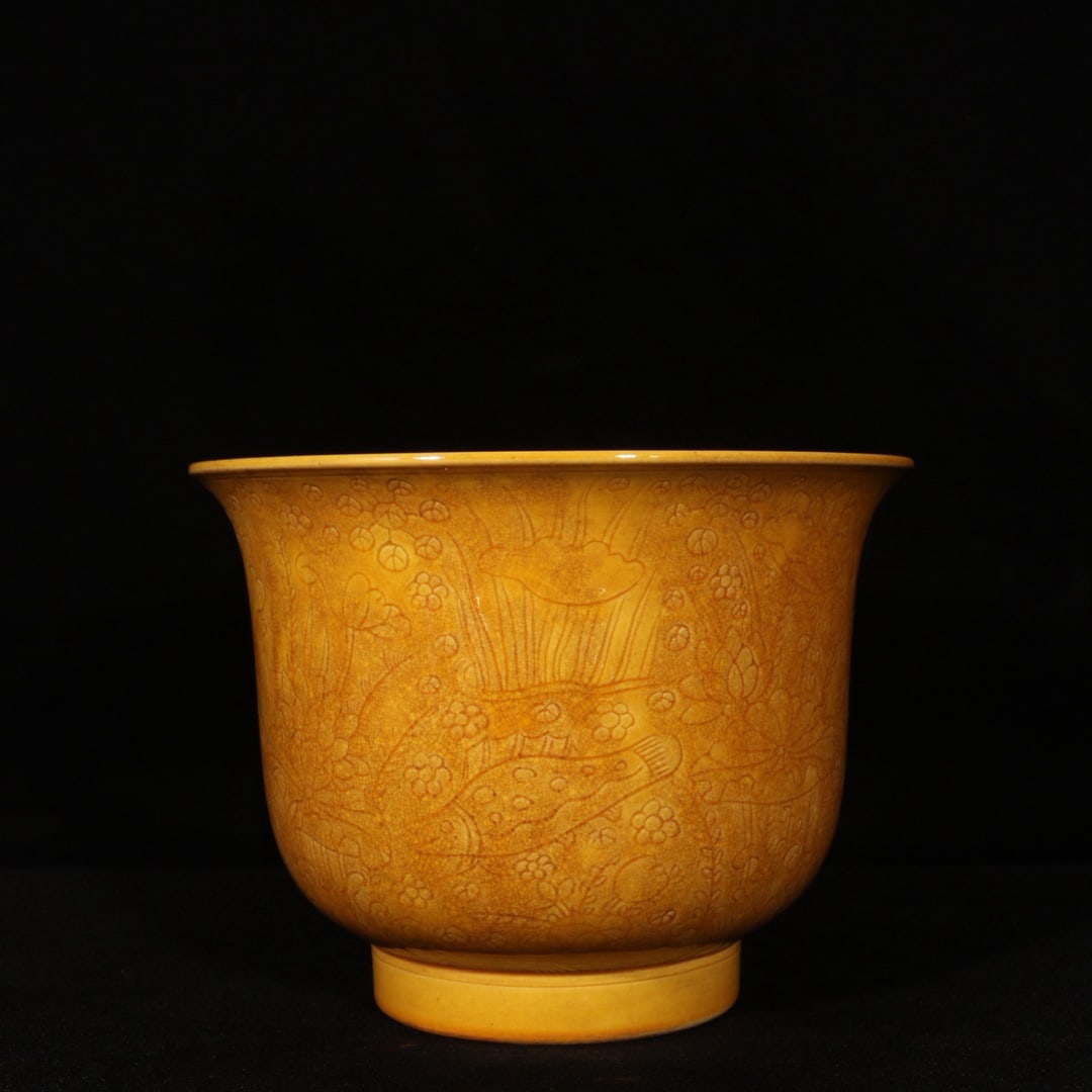 An Exquisite Yellow Glazed Flower and Fish Pattern Cup: An Exquisite Yellow Glazed Flower and Fish Pattern Cup,Ming Dynasty,China,Zhengde Six-character Mark,Size:5inx6.7in 黄釉花卉鱼纹杯,中国明