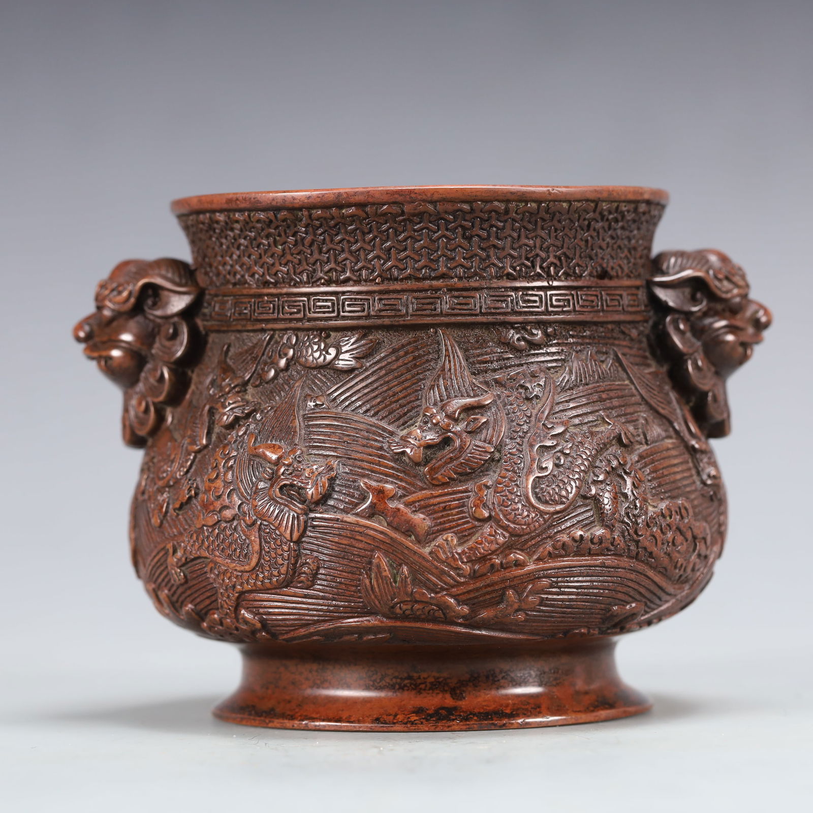 An Exquisite Bronze Dragon Pattern Double-Ears Censer: An Exquisite Bronze Dragon Pattern Double-Ears Censer,Ming Dynasty, China,Xuande Six-character Mark,Size:5.1inx4.3inx3.9in Weight:1050g 铜龙纹双耳香炉,中