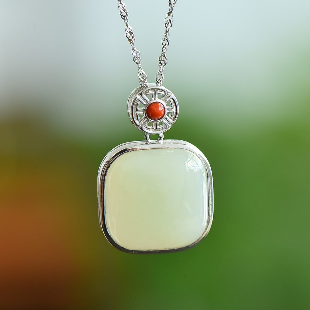 An Exquisite Sterling Silver Inlaid White Jade Pendant: An Exquisite Sterling Silver Inlaid White Jade Pendant,Size:0.7inx0.7in 纯银镶白玉吊坠