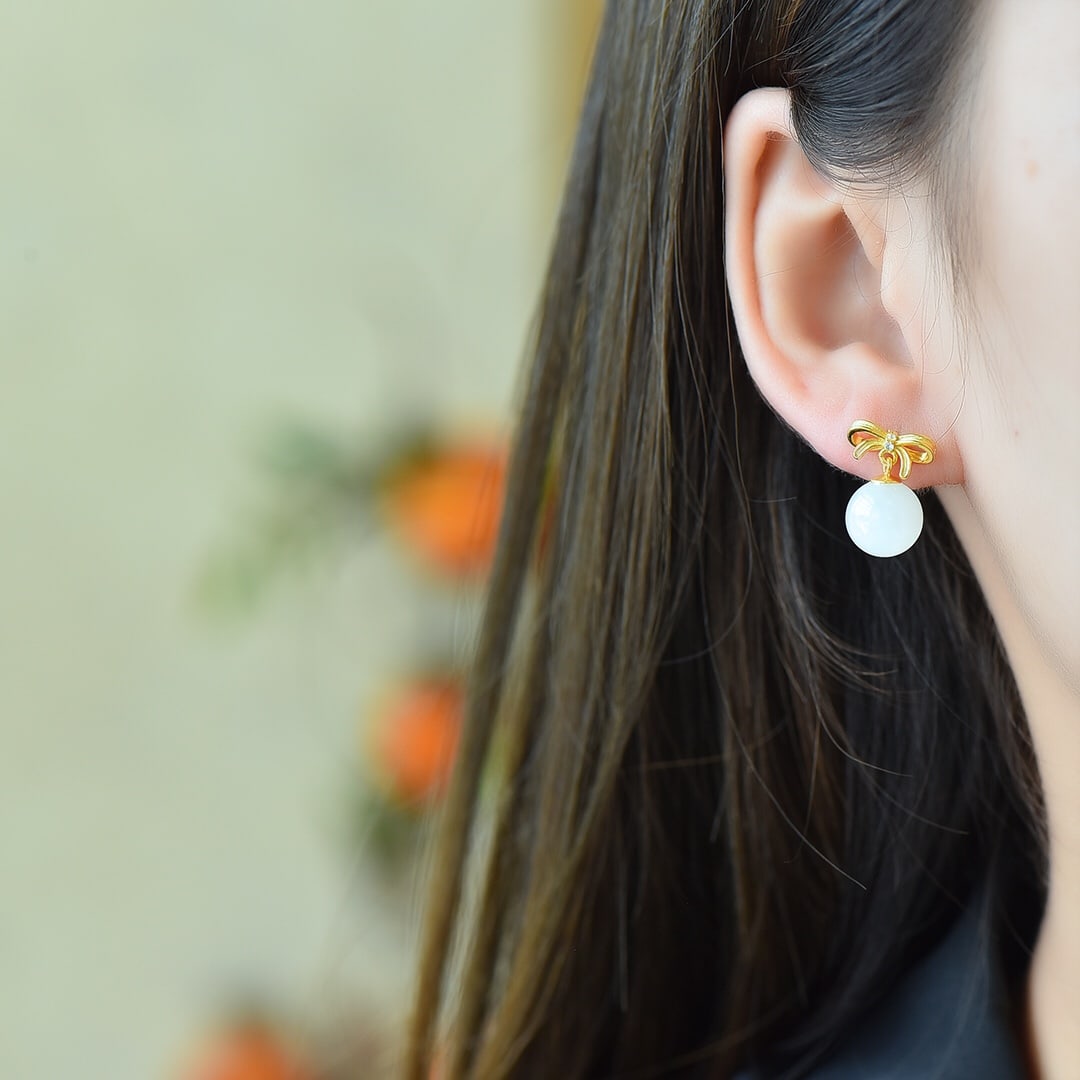 A Pair of Exquisite Sterling Silver-Gold Plated Inlaid White Jade Earrings: A Pair of Exquisite Sterling Silver-Gold Plated Inlaid White Jade Earrings 一对纯银镀金镶白玉耳环