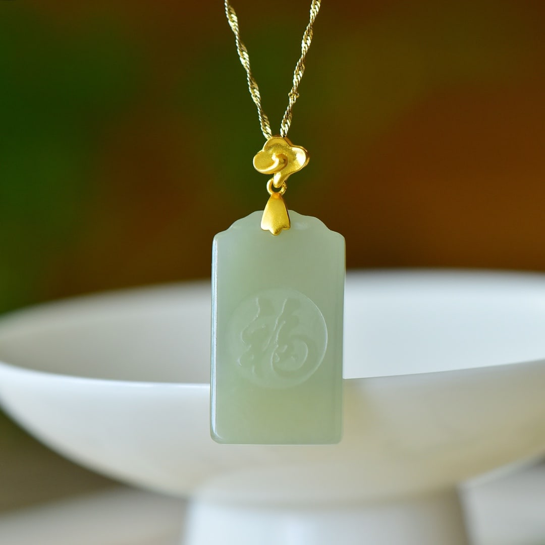 An Exquisite Sterling Silver-Gold Plated Inlaid Greenish Jade Pendant: An Exquisite Sterling Silver-Gold Plated Inlaid Greenish Jade Pendant,Size:0.8inx1.4in 纯银镀金镶青玉吊坠
