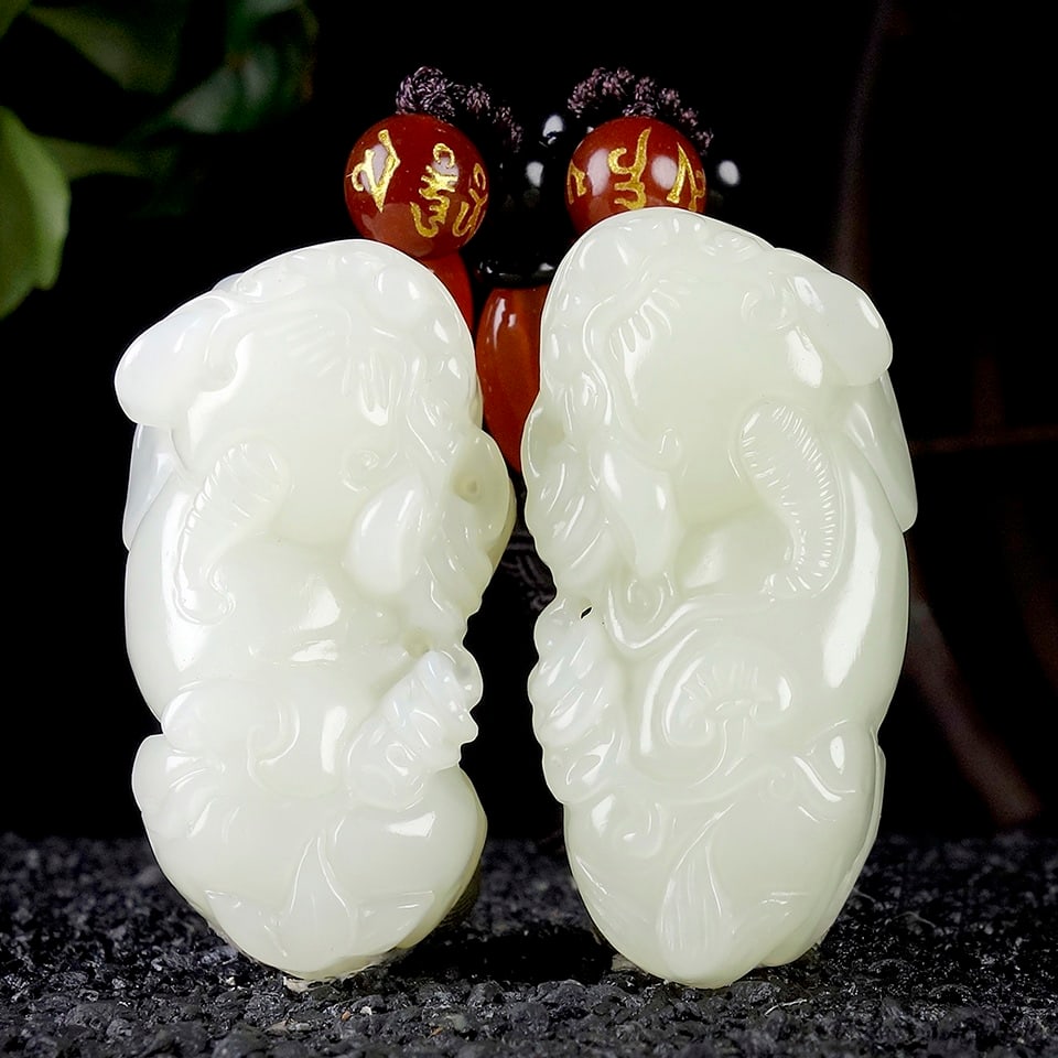 A Pair of Exquisite White Jade Auspicious Beast Pendant: A Pair of Exquisite White Jade Auspicious Beast Pendant,Size:1.7inx0.9inx0.6in 一对白玉貔貅挂件