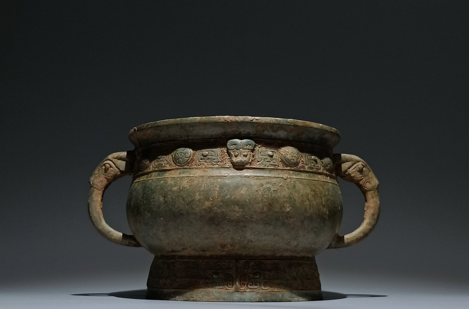 An Archaic Bronze Beast-Face Pattern Double-Ears Food Vessel: An Archaic Bronze Beast-Face Pattern Double-Ears Food Vessel,Shang Dynasty, China,Size:5.9inx7.9in 