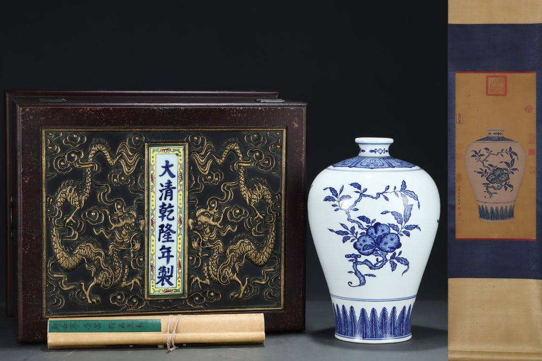 A Rare Blue and White Melon and Fruit Pattern Vase,With Vertical Scroll Painting on Silk: A Rare Blue and White Melon and Fruit Pattern Vase,With Vertical Scroll Painting on Silk,Qing Dynasty, China,Qianlong Six-character Mark,Size:(Porcelain)13.7inx9.1in,(Vertical Scroll)24inx11.8in 