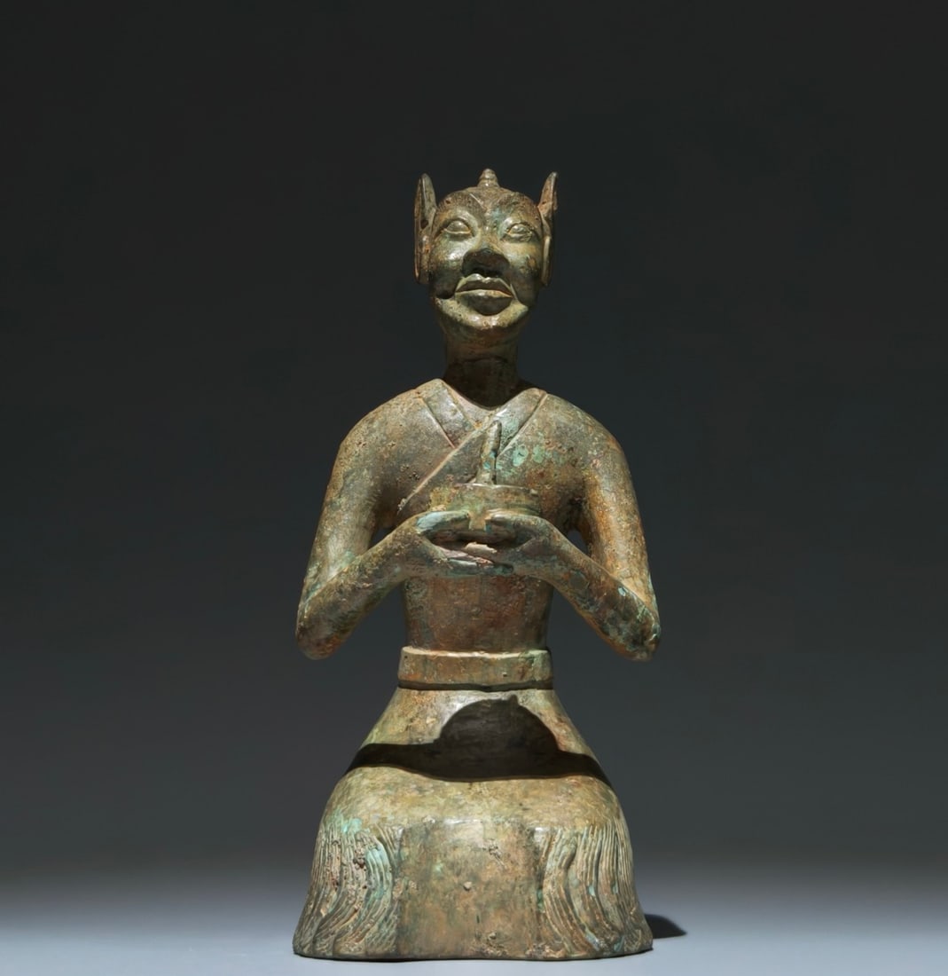 An Archaic Bronze Figure-Shaped Candlestick (1 of 9)