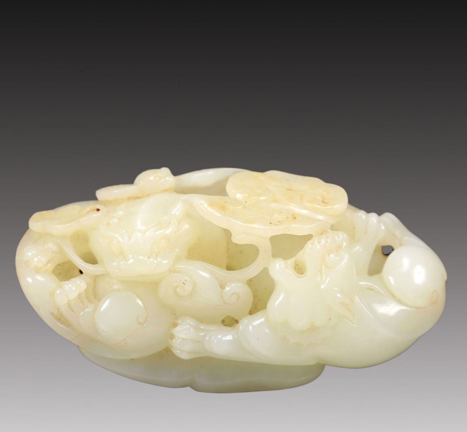 An Excellent White Jade 'Auspicious Cloud& Lion' Decoration (1 of 4)