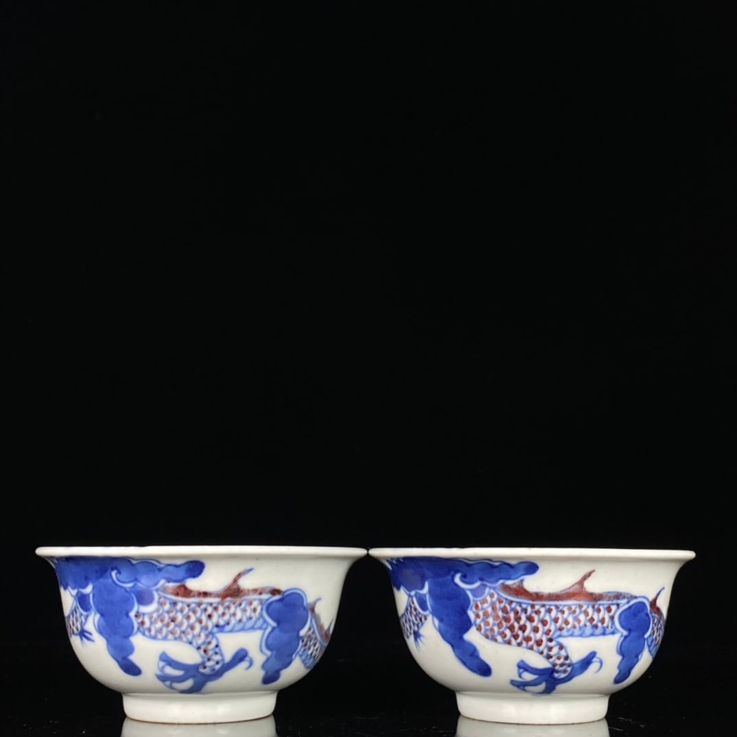 A Pair of Exquisite Blue and White Underglaze-Red Auspicious Cloud and Dragon Pattern Cups: A Pair of Exquisite Blue and White Underglaze-Red Auspicious Cloud and Dragon Pattern Cups,Qing Dynasty, China,Size:1.9inx3.7in 