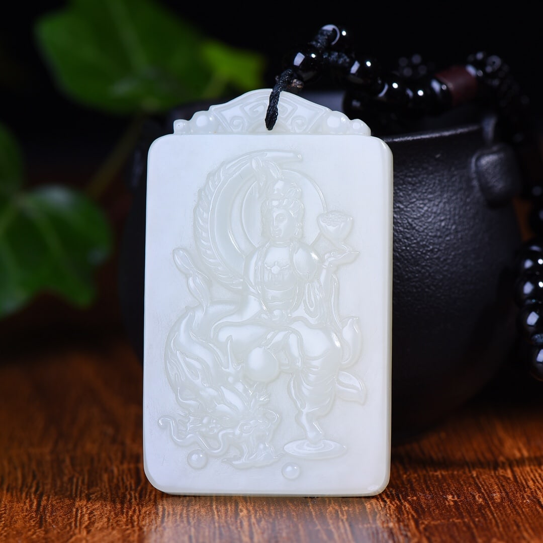 An Exquisite White Jade Avalokitesvara Pattern Pendant: An Exquisite White Jade Avalokitesvara Pattern Pendant,Size:36mmx60mm (寓意)吉祥 有福相伴 保平安 