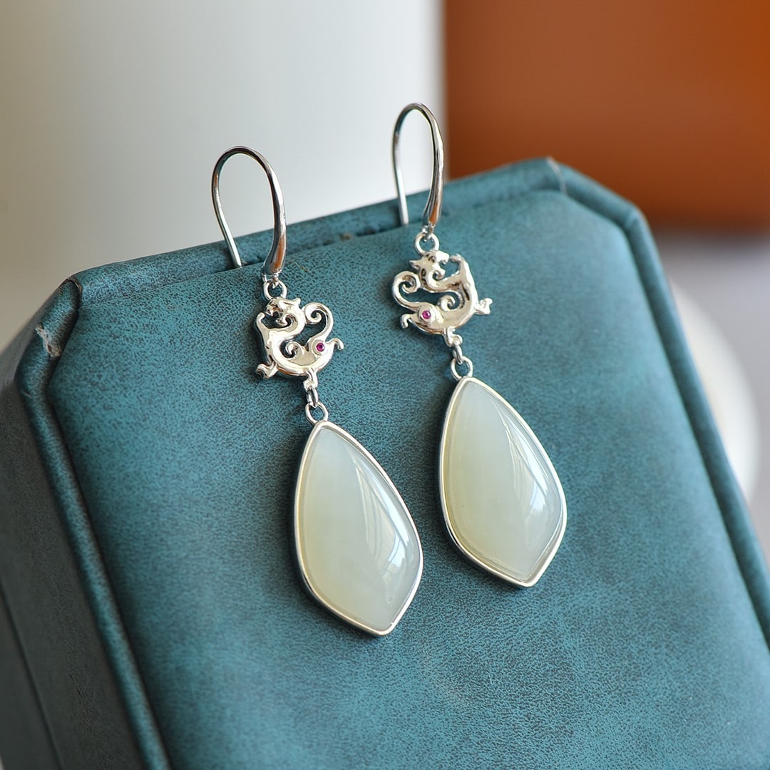 A Pair of Exquisite Sterling Silver Inlaid White Jade Earrings: A Pair of Exquisite Sterling Silver Inlaid White Jade Earrings,Size:13mmx18mm 一对纯银镶白玉耳环