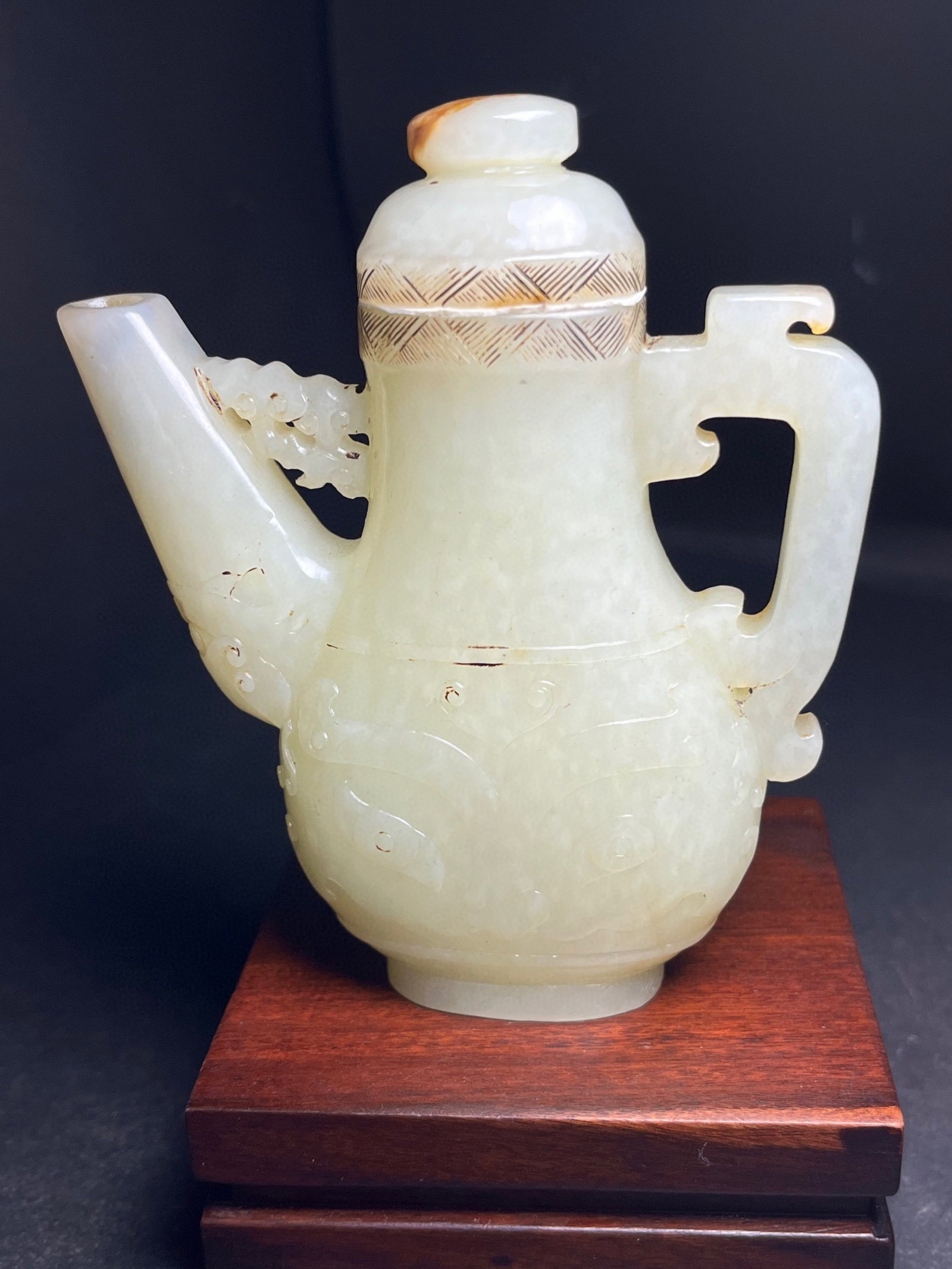 An Exquisite White Jade Beast-Face Pattern Flagon: An Exquisite White Jade Beast-Face Pattern Flagon,Qing Dynasty,China,Size:105mmx32mmx90mm,Weight:200g 白玉兽面纹酒壶,中国清代