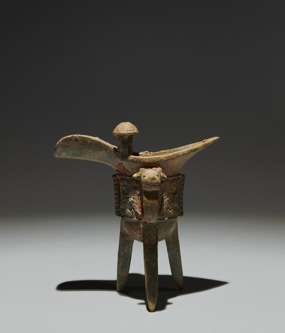 An Archaic Bronze Beast-Face Pattern Tripod Goblet (1 of 9)