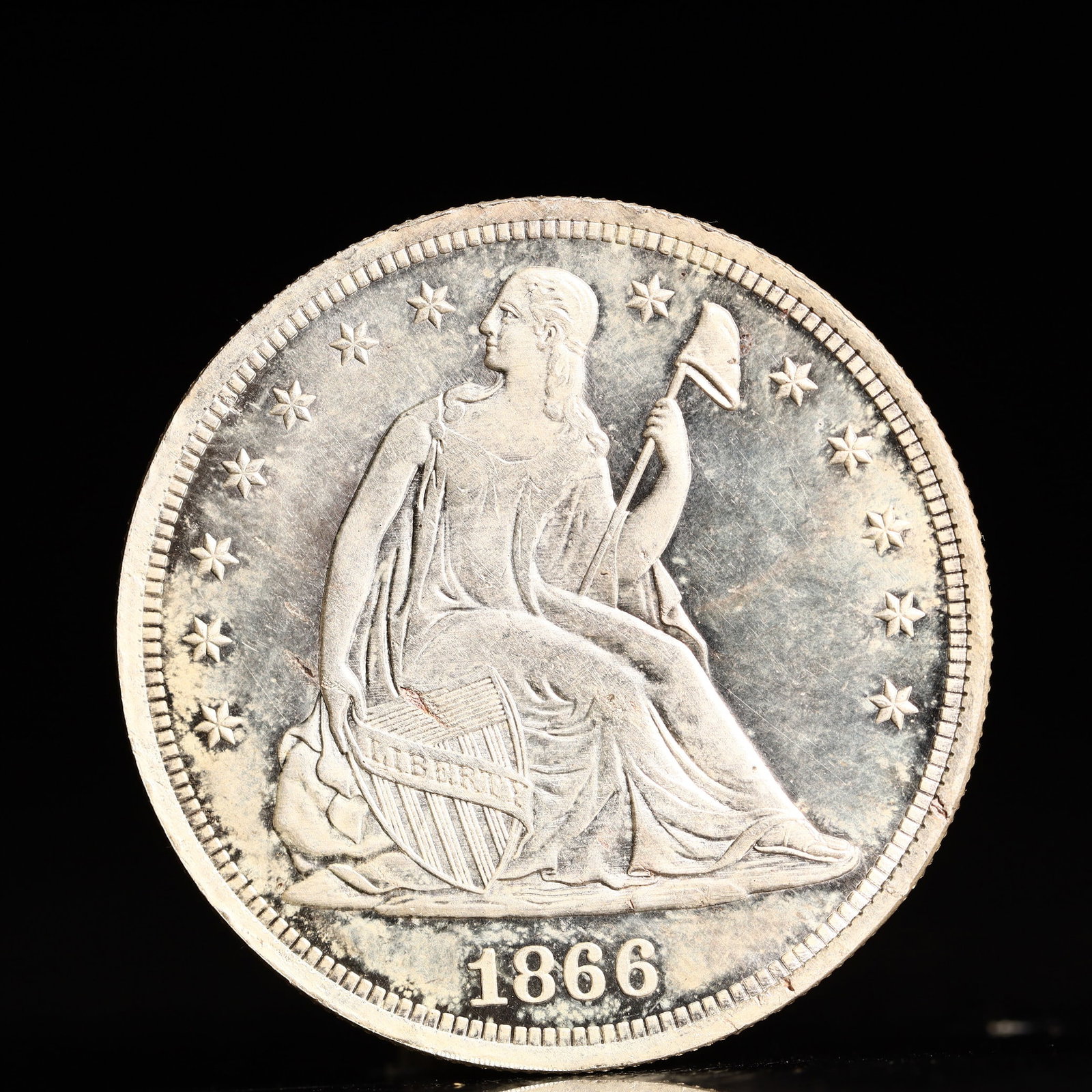USA One Dollar 1866 Coin: American coin. IN GOD WE TRUST / LIBERTY / 1866 / UNITED STATES OF AMERICA / ONE DOL. Weight:26.9g.