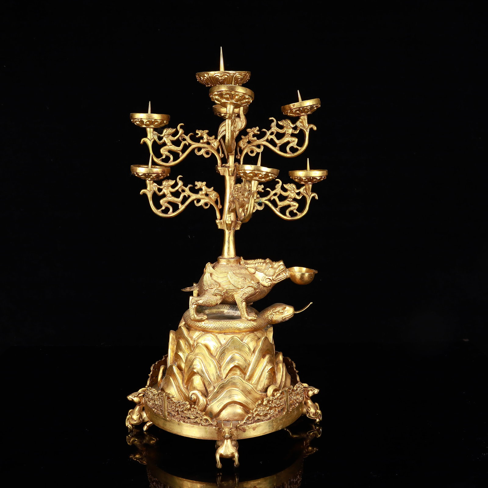 A Rare Gilt Bronze Wealth-Attracting Creature and Snake Pattern Candlestick: A Rare Gilt Bronze Wealth-Attracting Creature and Snake Pattern Candlestick,The Warring States period in China,With Mark,Size:9.8inx18.1in,Weight:5900g 