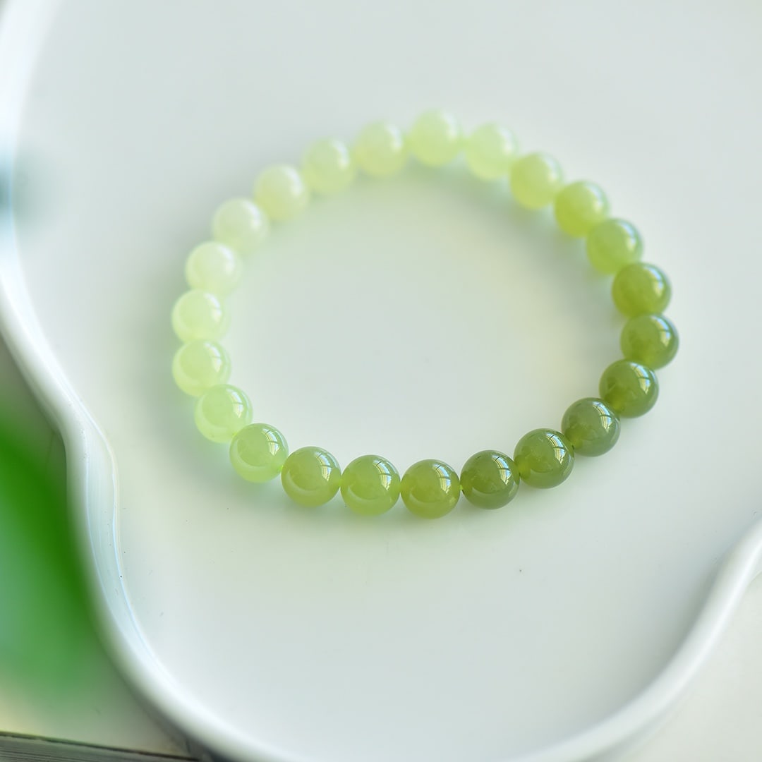 An Exquisite Greenish Jade Bracelets: An Exquisite Greenish Jade Bracelets,Size:8mm 青白玉手串