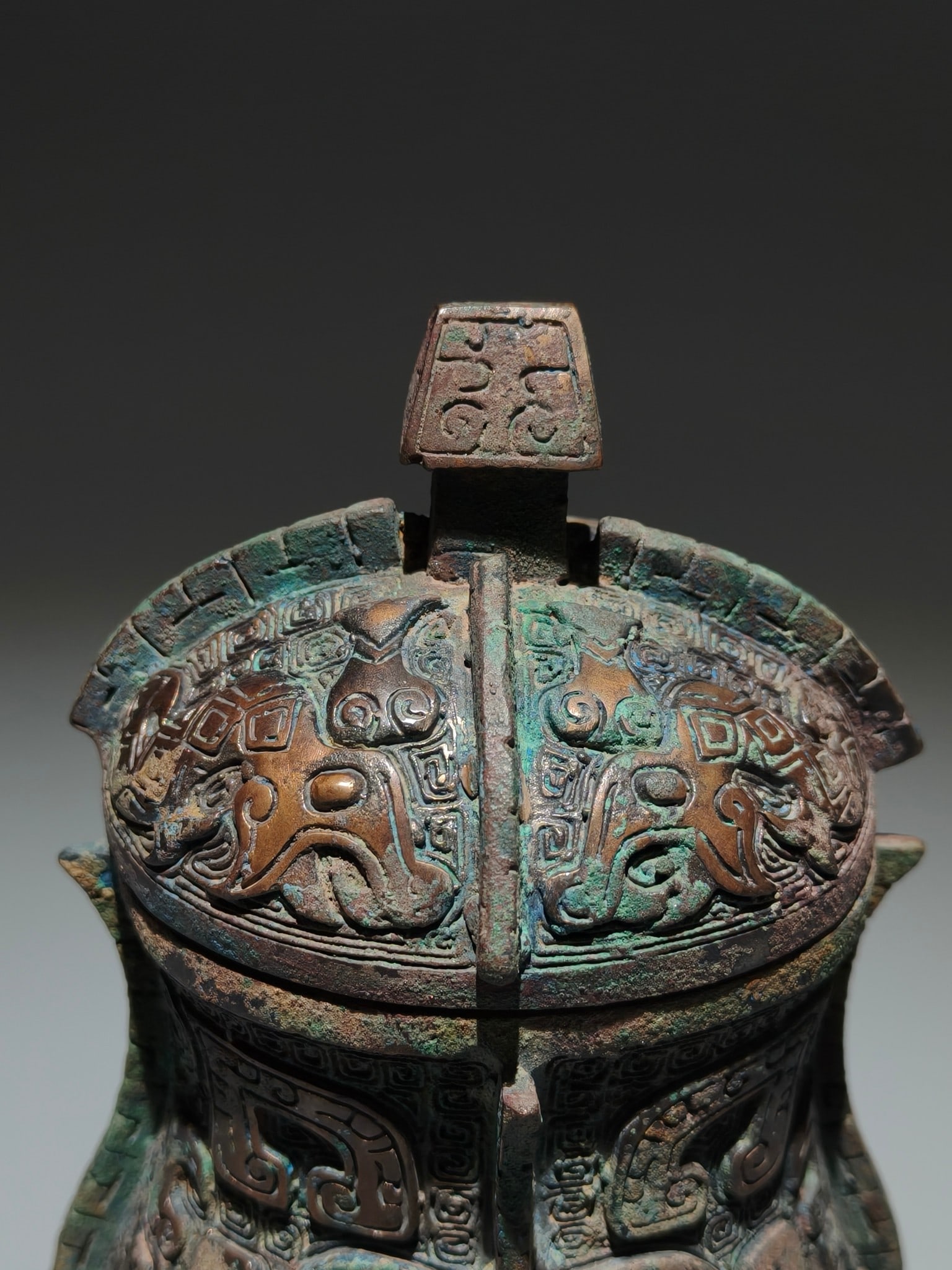 An Archaic Bronze Beast-Face Pattern Libation Cup - 2