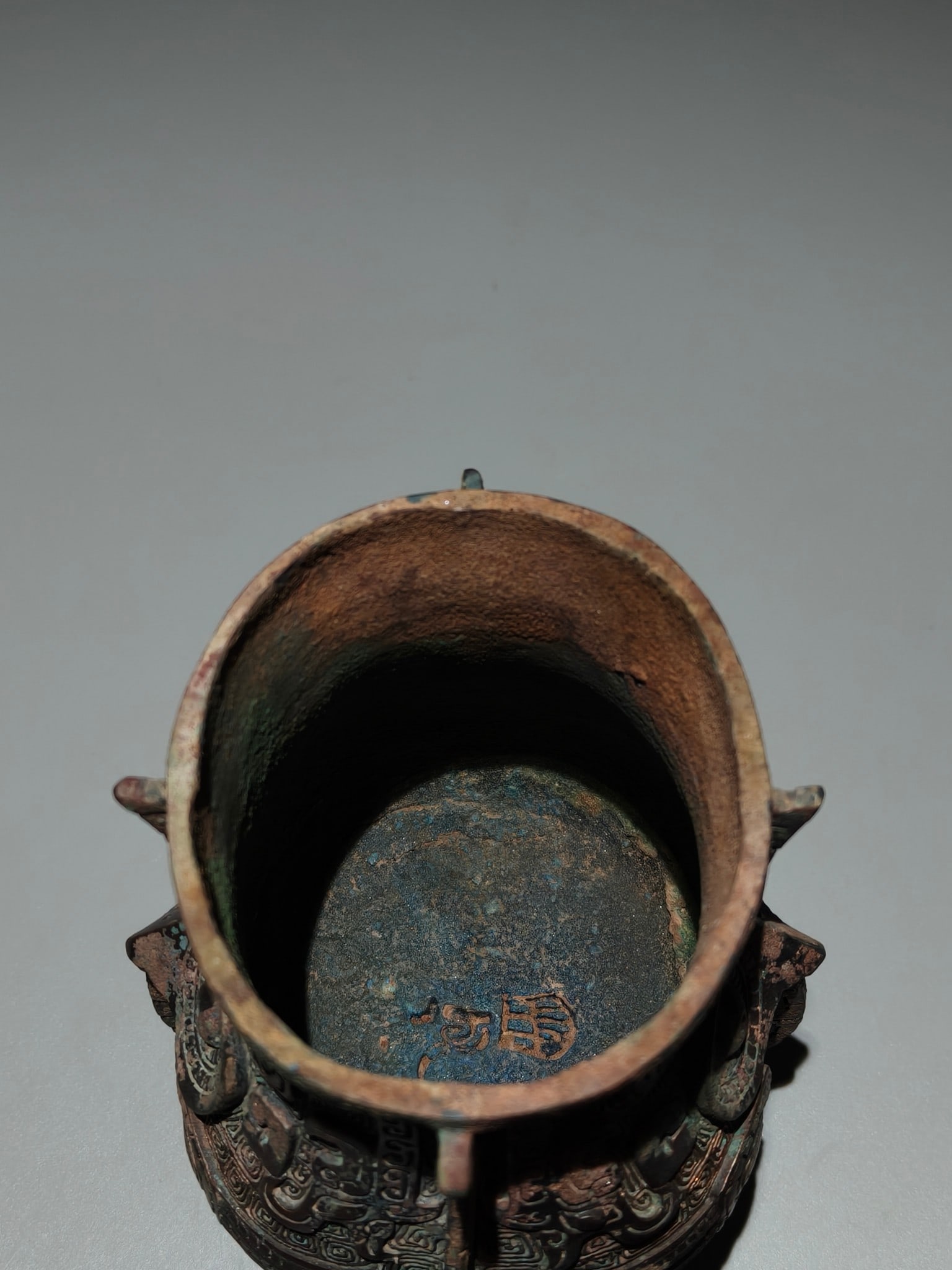 An Archaic Bronze Beast-Face Pattern Libation Cup - 8