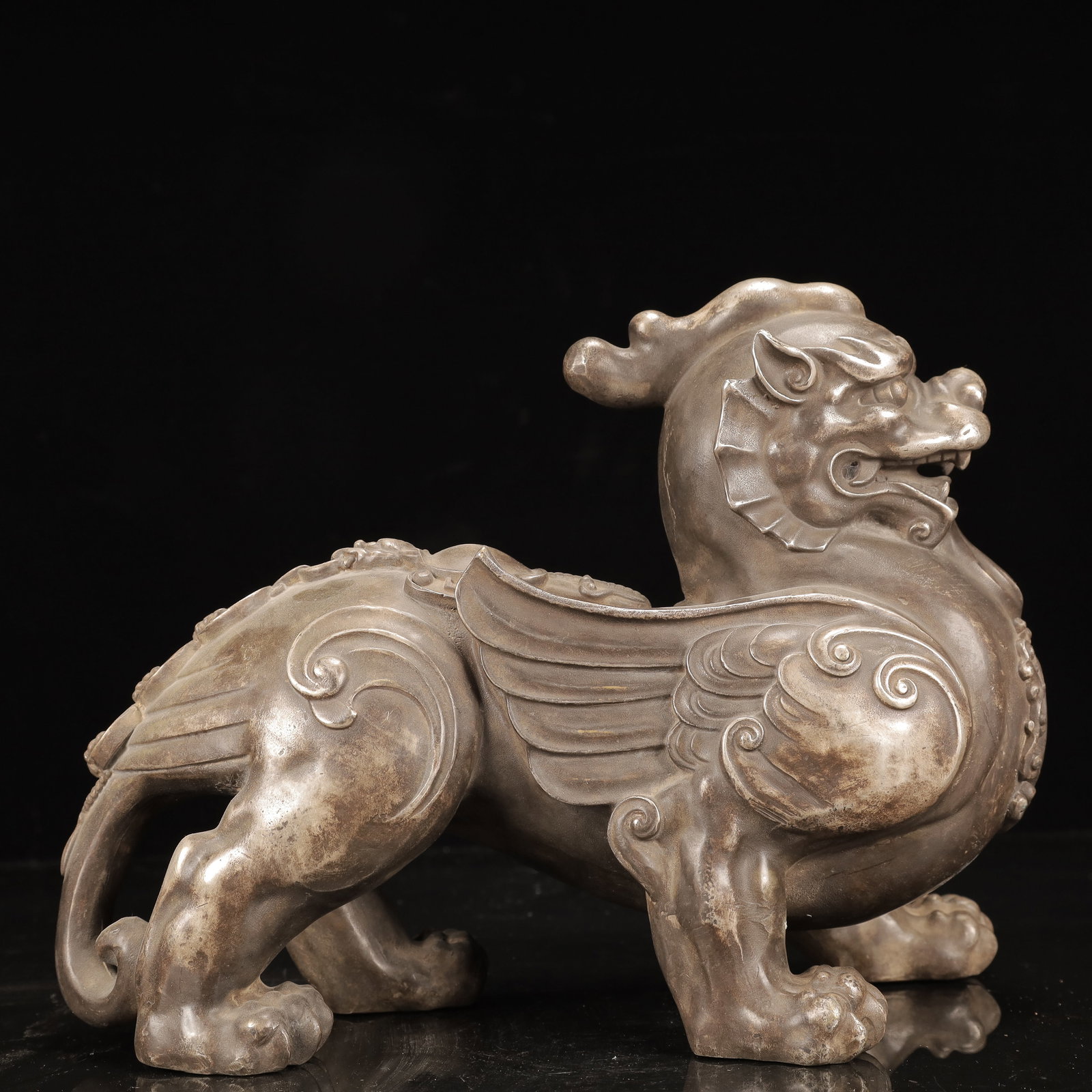 An Exquisite Silver-Plated Bronze Lion Ornament: An Exquisite Silver-Plated Bronze Lion Ornament,Qing Dynasty, China,Size:11inx5.5inx7.9in,Weight:4800g 铜镀银狮子摆件,中国清代