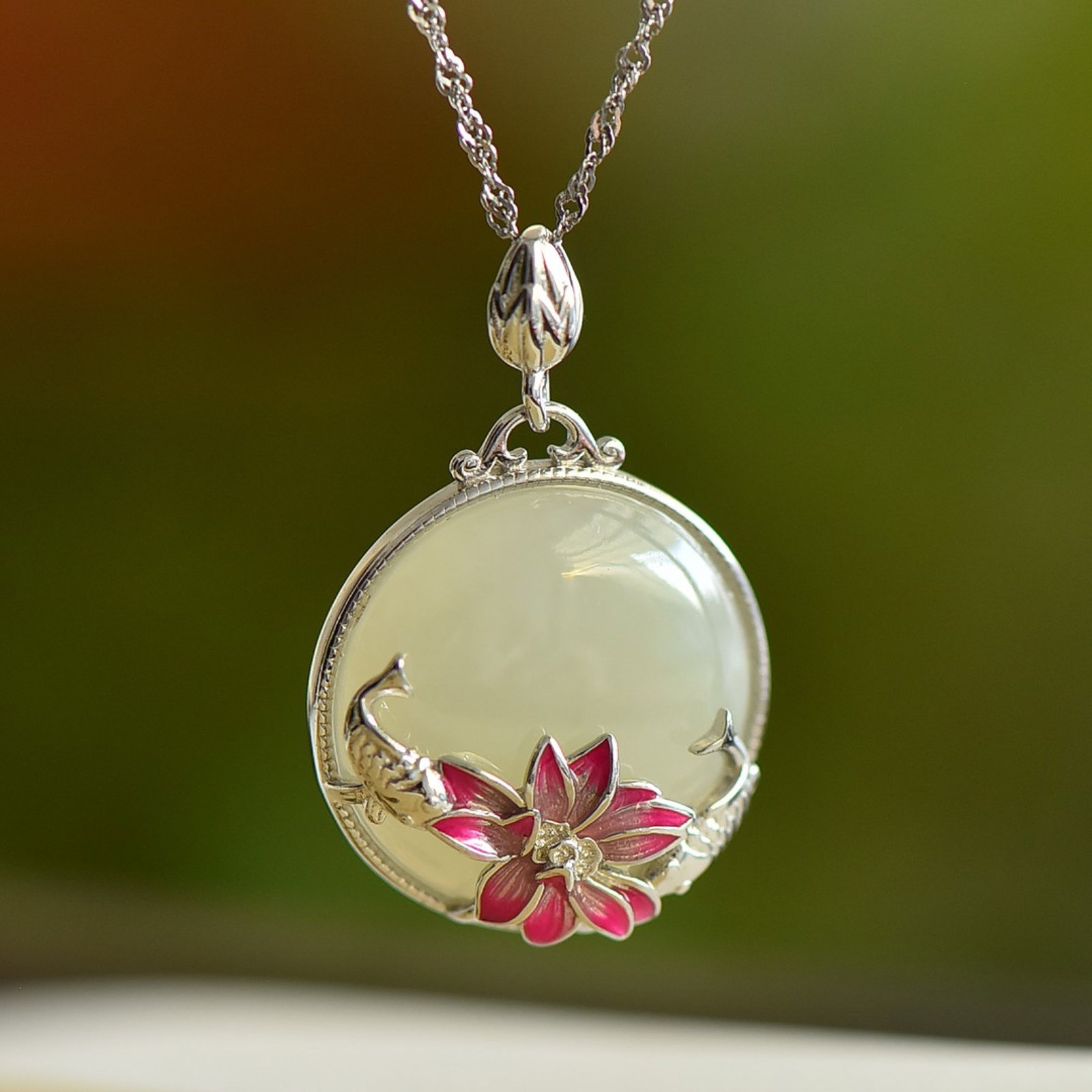 An Exquisite Sterling Silver Inlaid White Jade Pendant: An Exquisite Sterling Silver Inlaid White Jade Pendant 纯银镶白玉吊坠