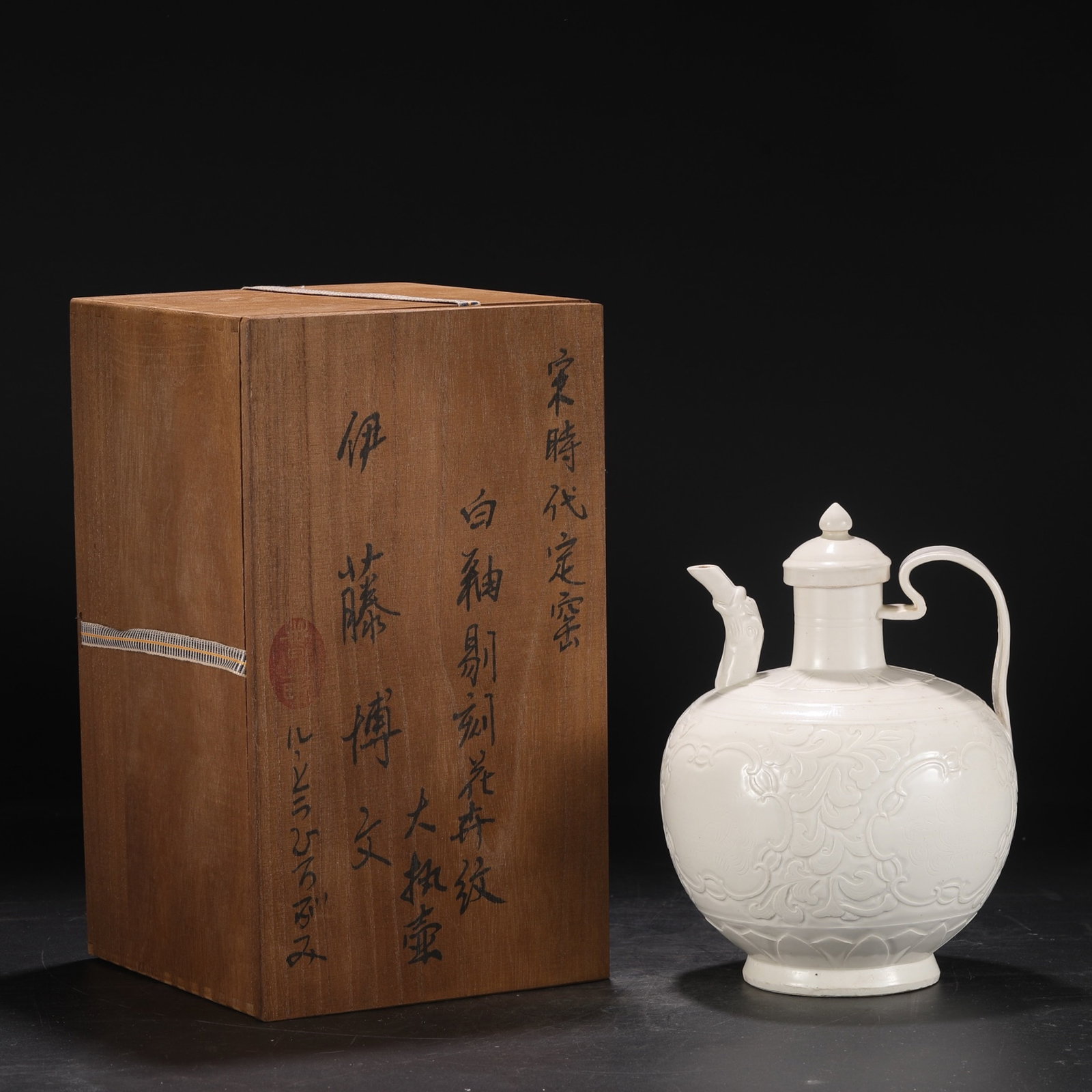 An Exquisite Ding yao White Glazed Flower Pattern Ewer (1 of 8)