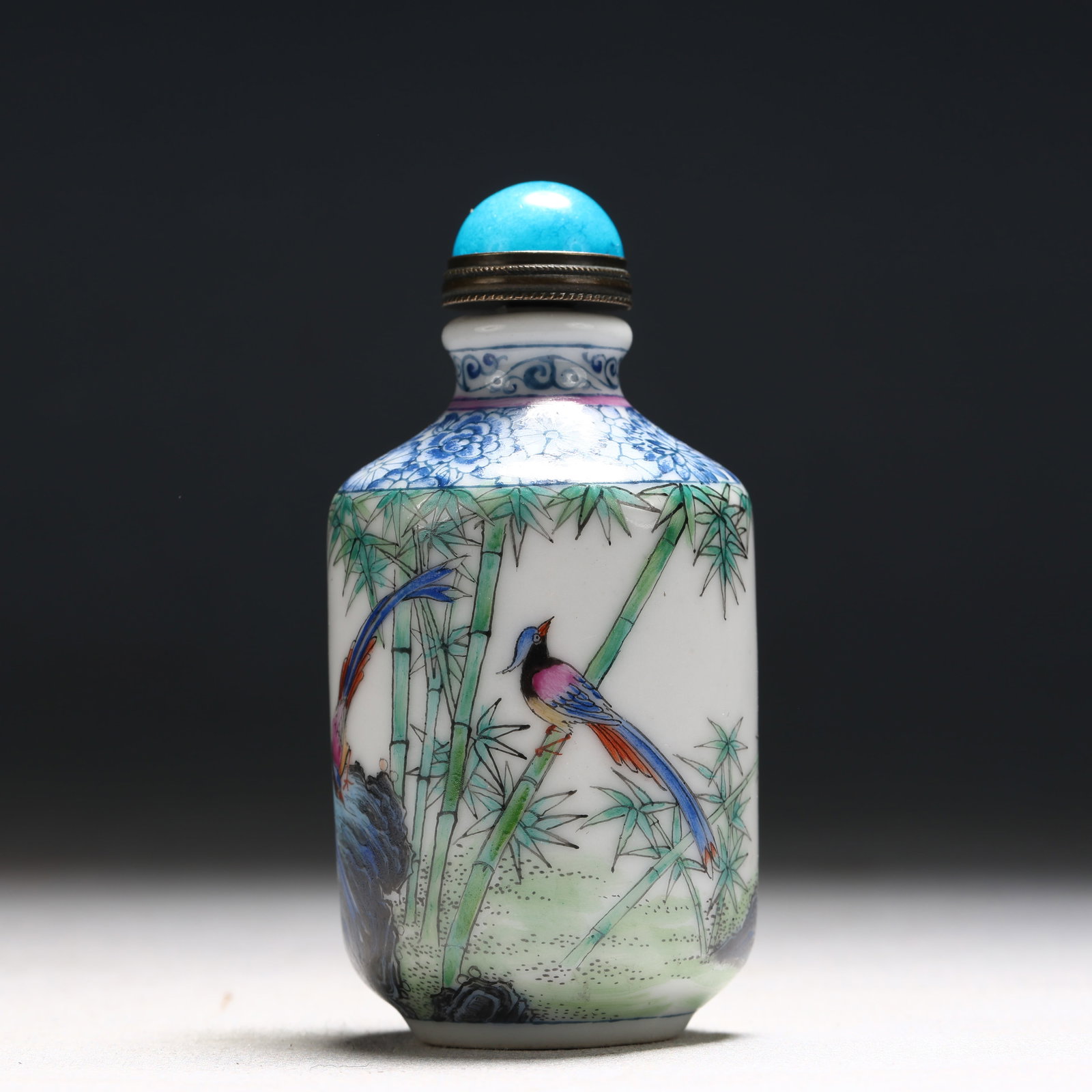 An Exquisite Enamel Bamboo Flower and Bird Pattern Porcelain Snuff Bottle: An Exquisite Enamel Bamboo Flower and Bird Pattern Porcelain Snuff Bottle,Qing Dynasty, China,Kangxi Four-character Mark,Size:1.4inx1.4inx3.1in 瓷胎画珐琅彩竹